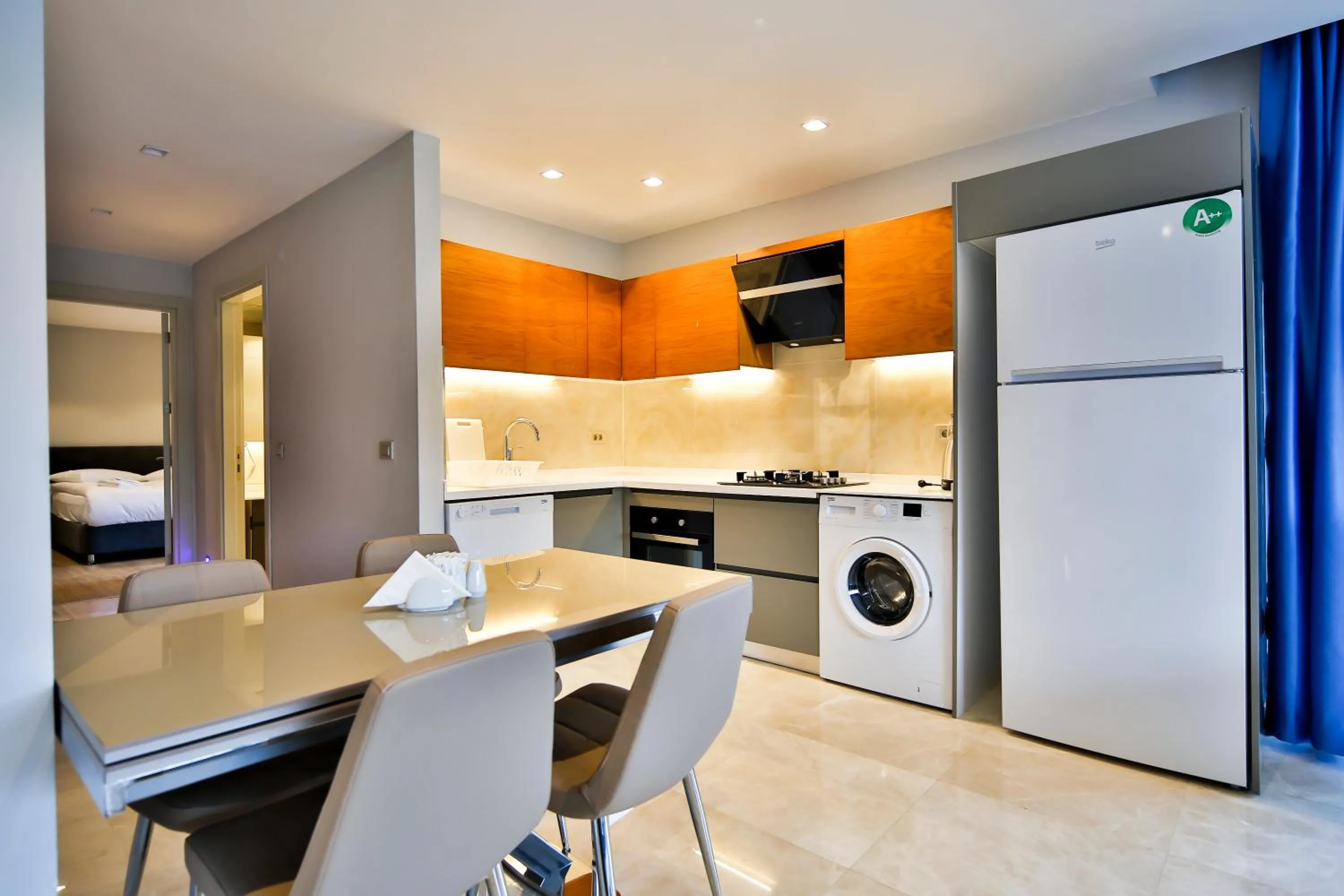Kitchen or kitchenette in MENE SUITES