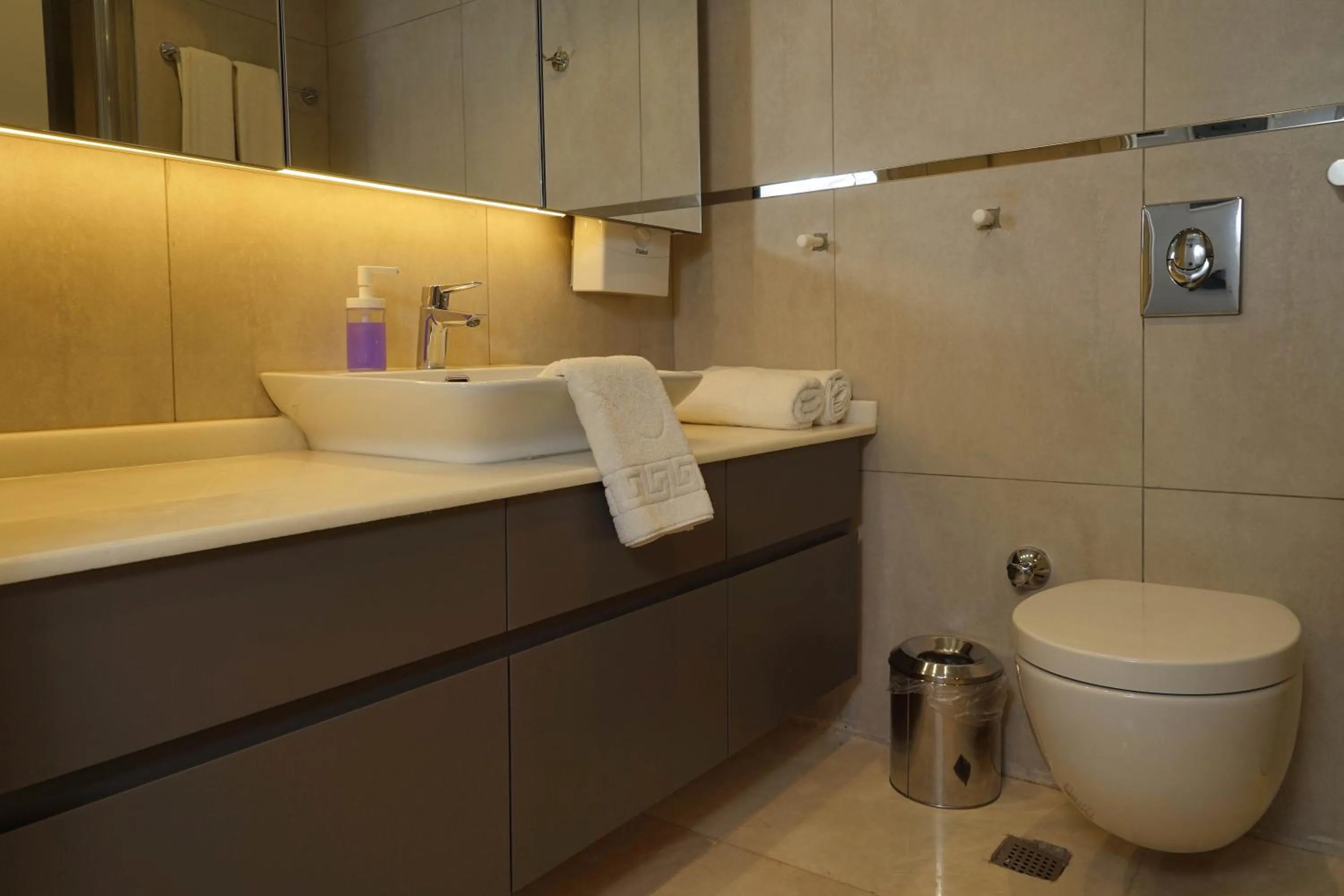 Toilet in MENE SUITES