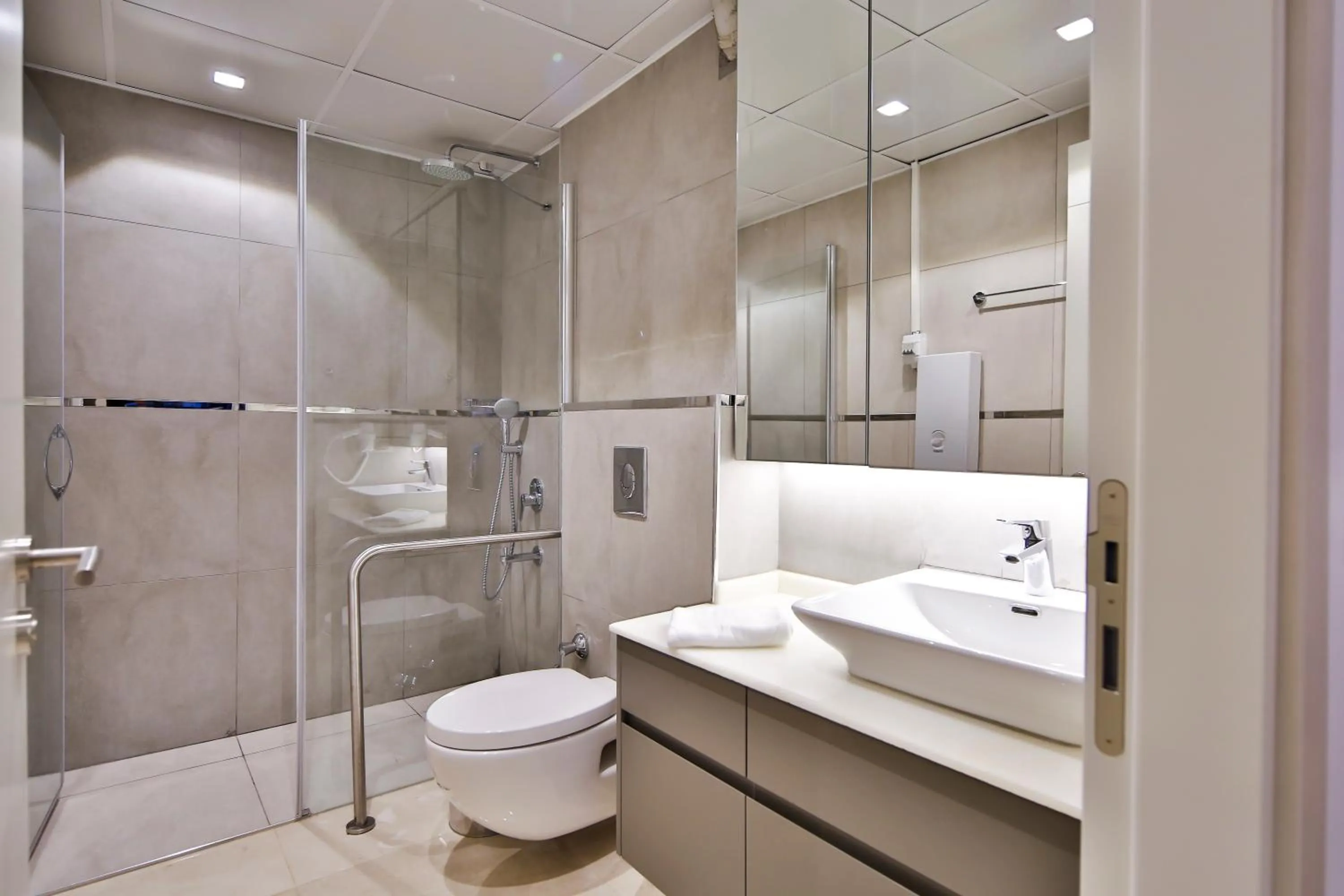 Shower in MENE SUITES