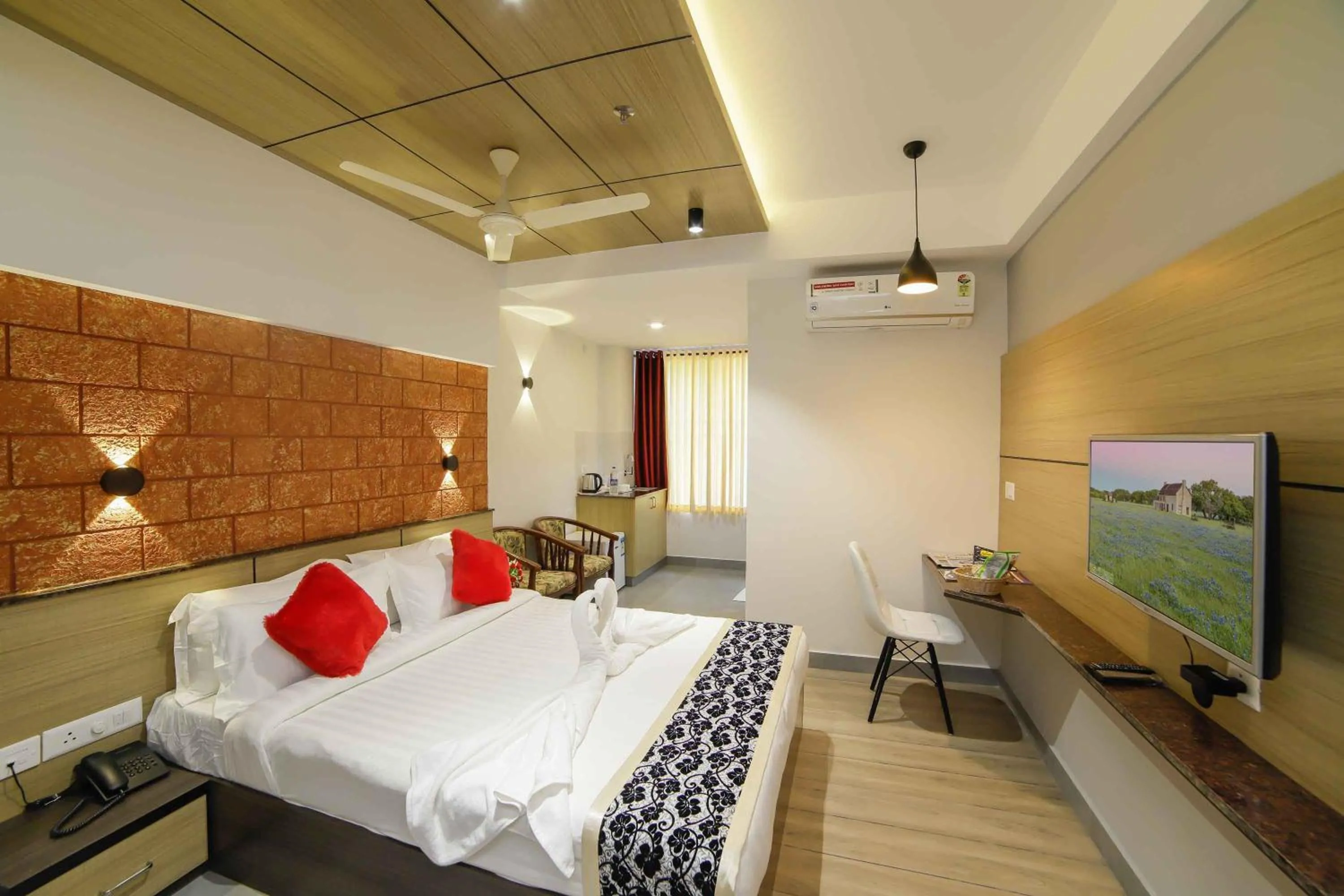 Photo of the whole room, Bed in Bhavanam Regency Guruvayoor