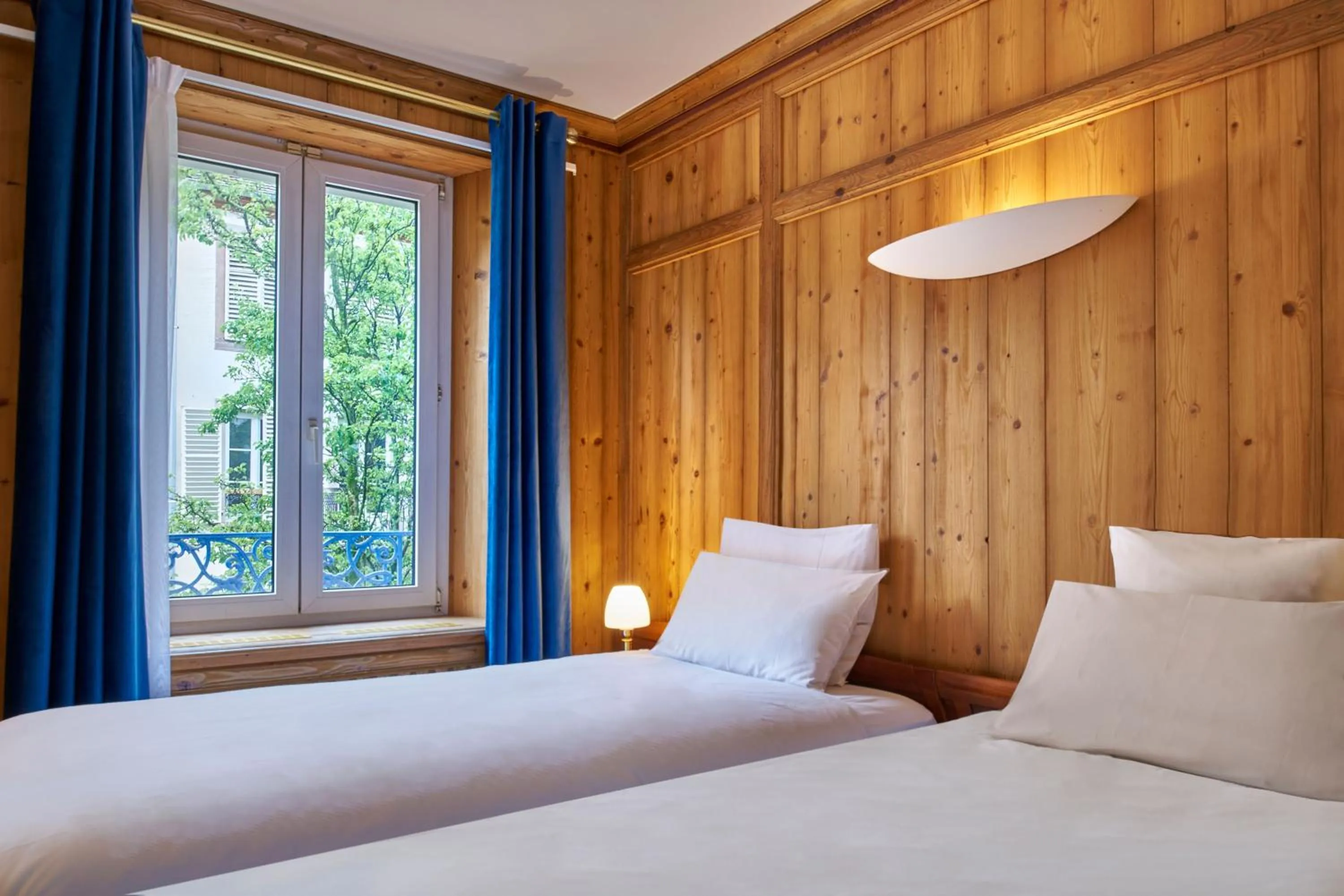 Bed in Hôtel de l'Europe by HappyCulture