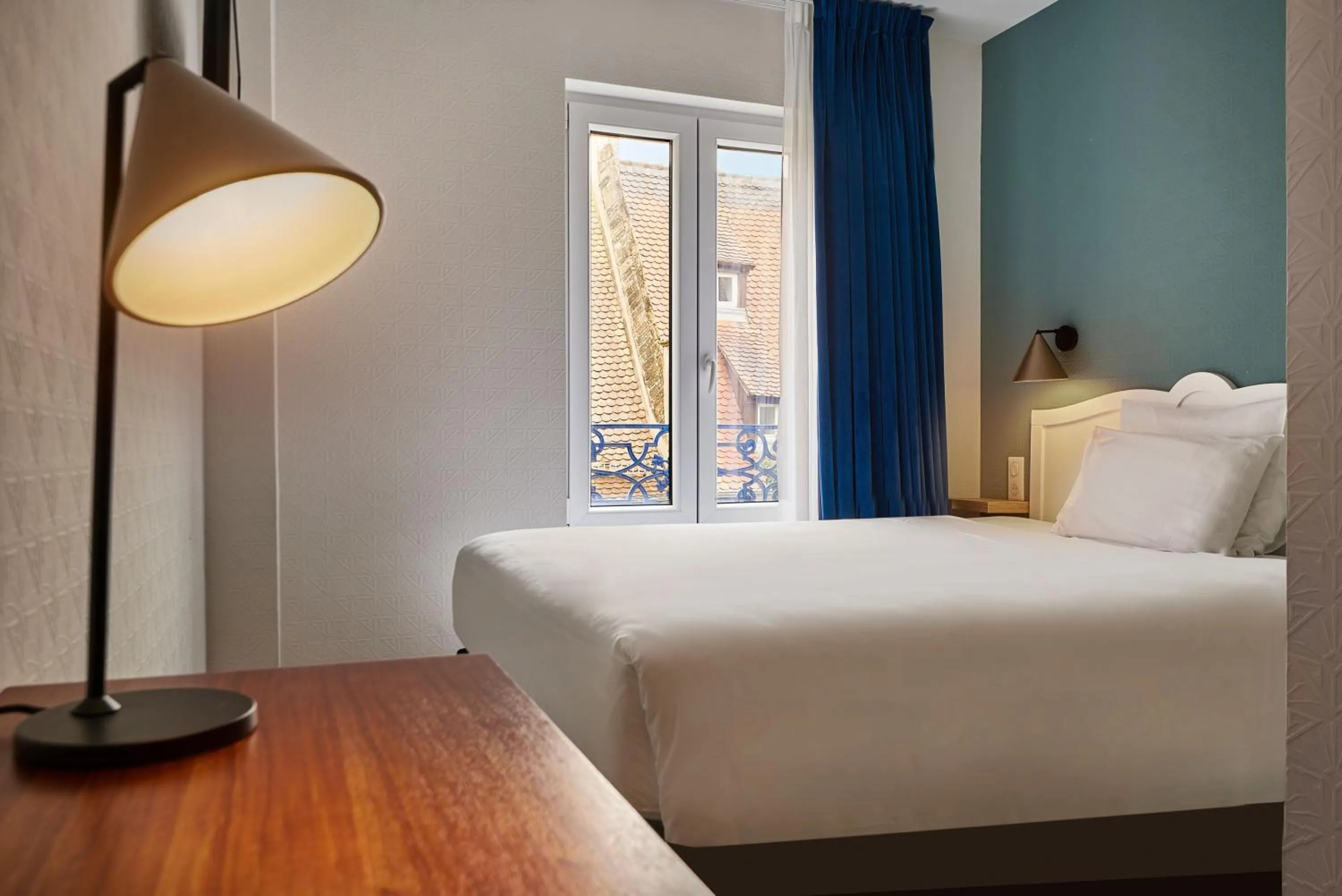 Bed in Hôtel de l'Europe by HappyCulture