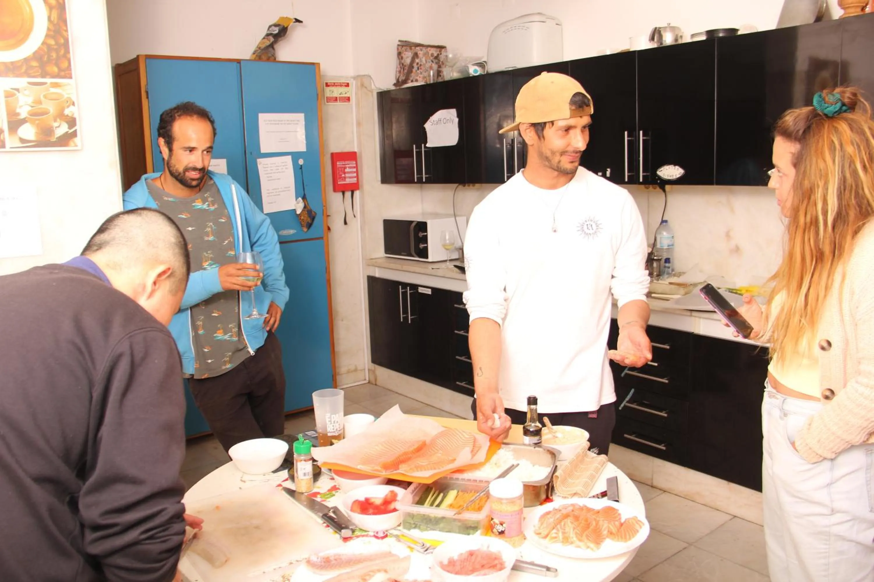 People in Carcavelos Surf Hostel Beach