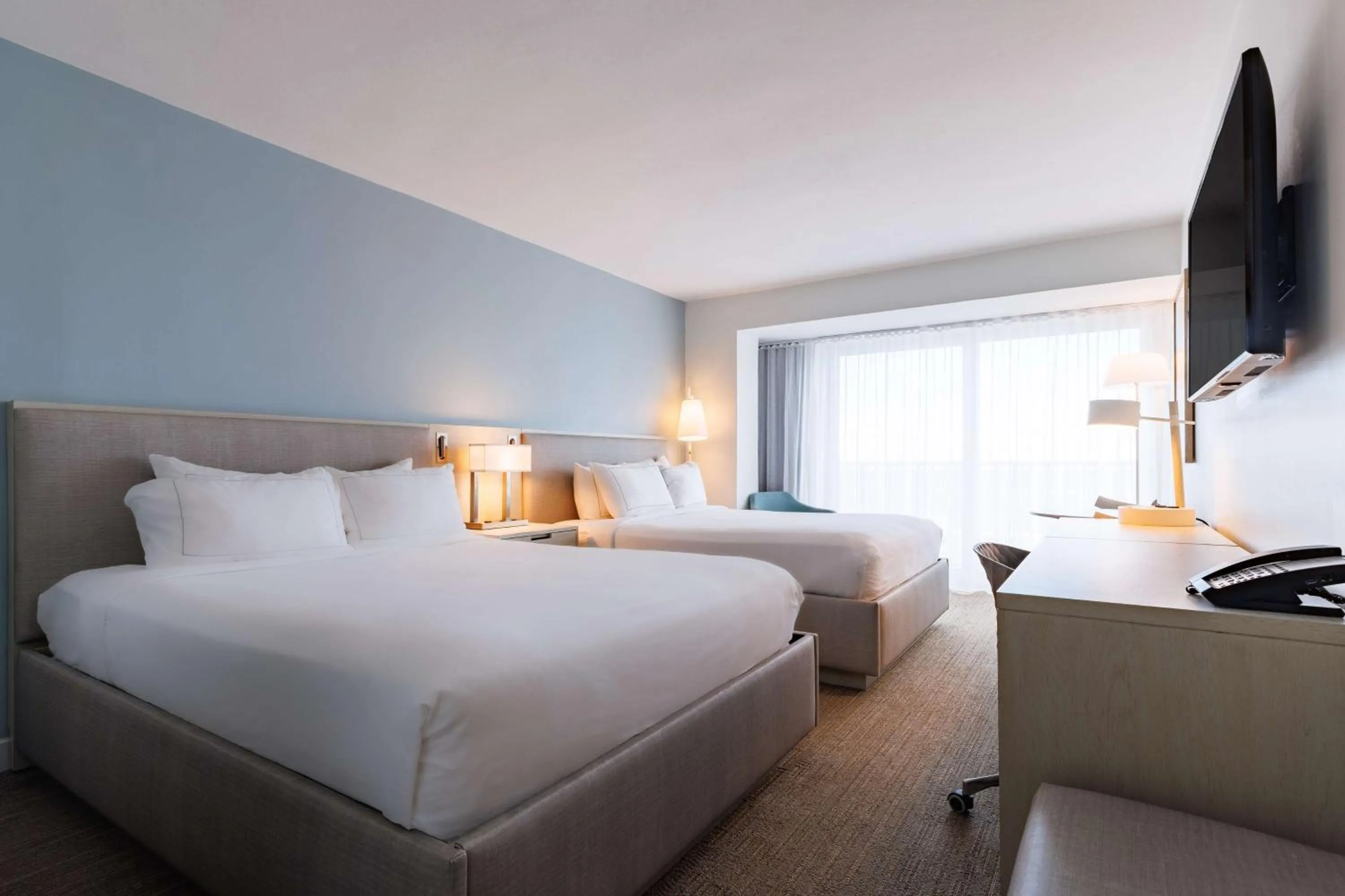 Bed in Condado Palm Inn San Juan, Tapestry Collection by Hilton