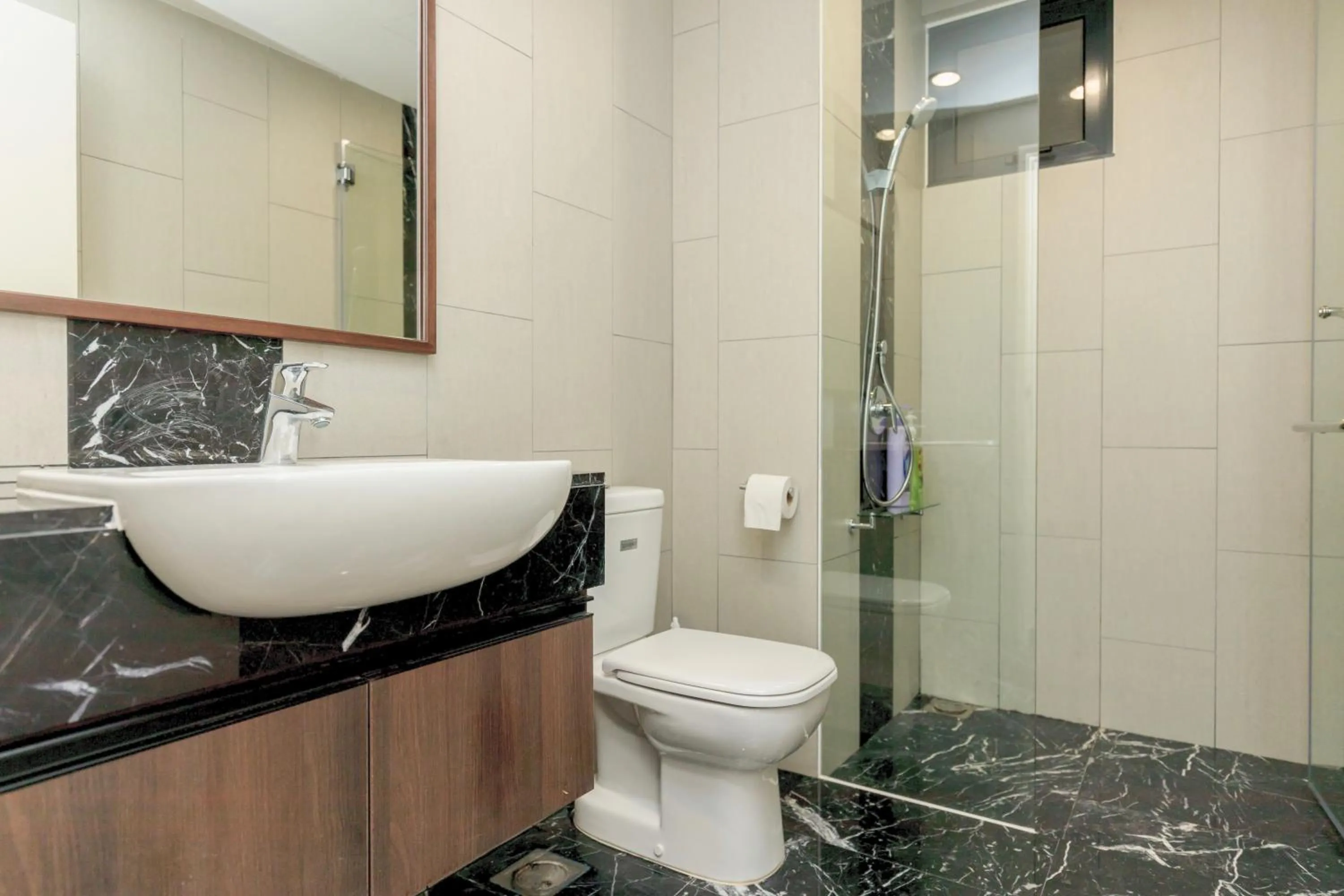 Shower in The Landmark Condo, by Sanguine