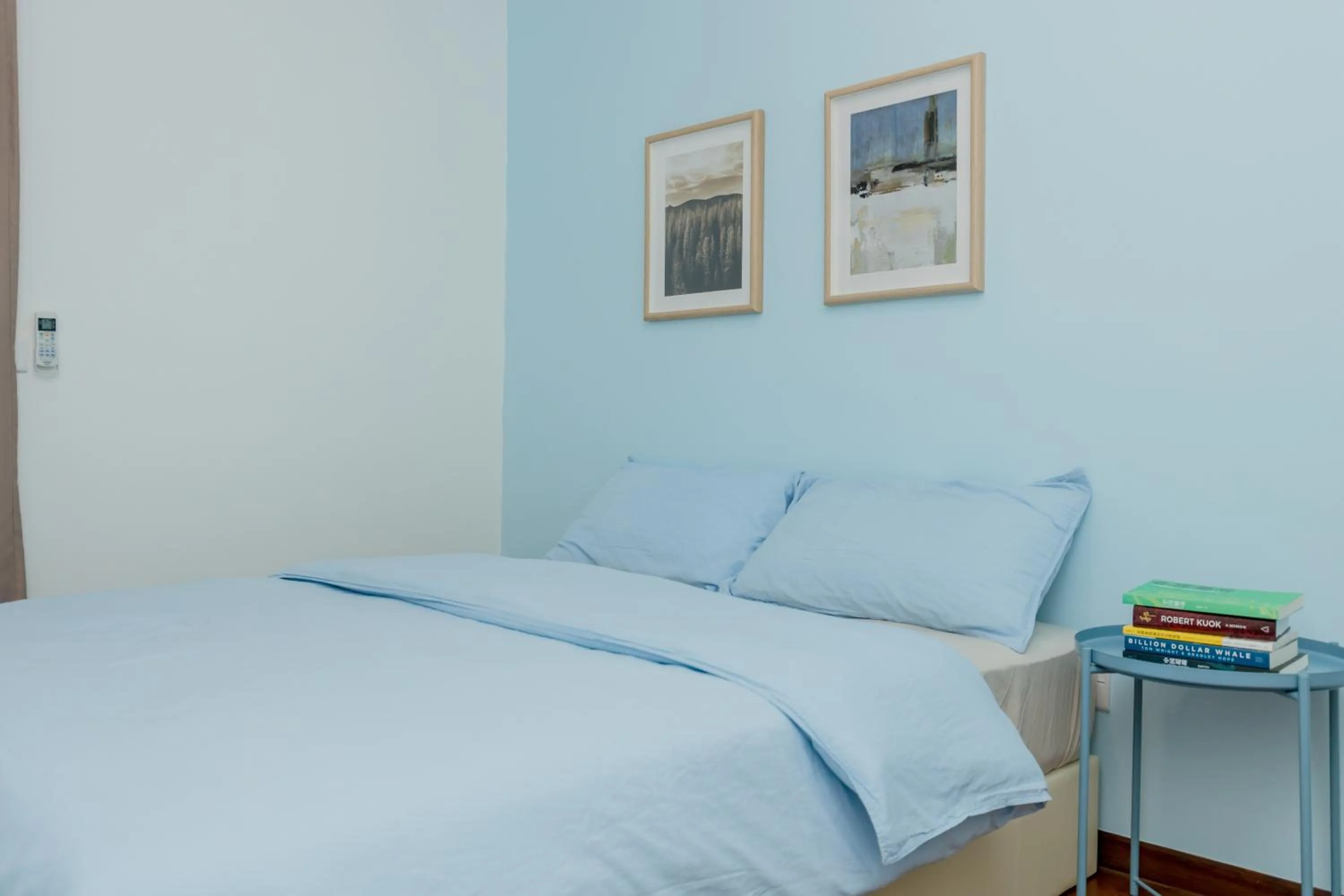 Bed in The Landmark Condo, by Sanguine