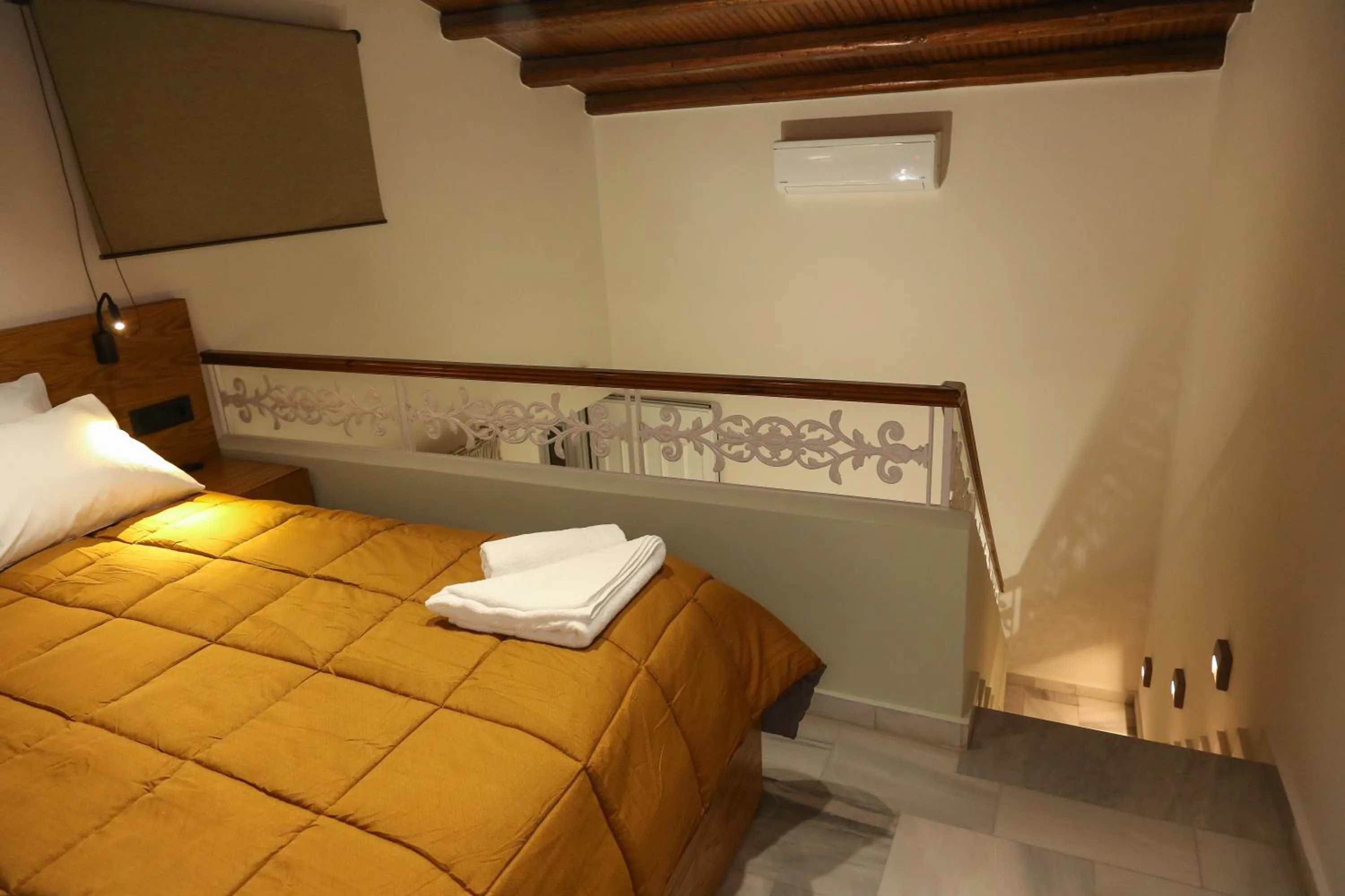 Photo of the whole room, Bed in Heaven Apartments