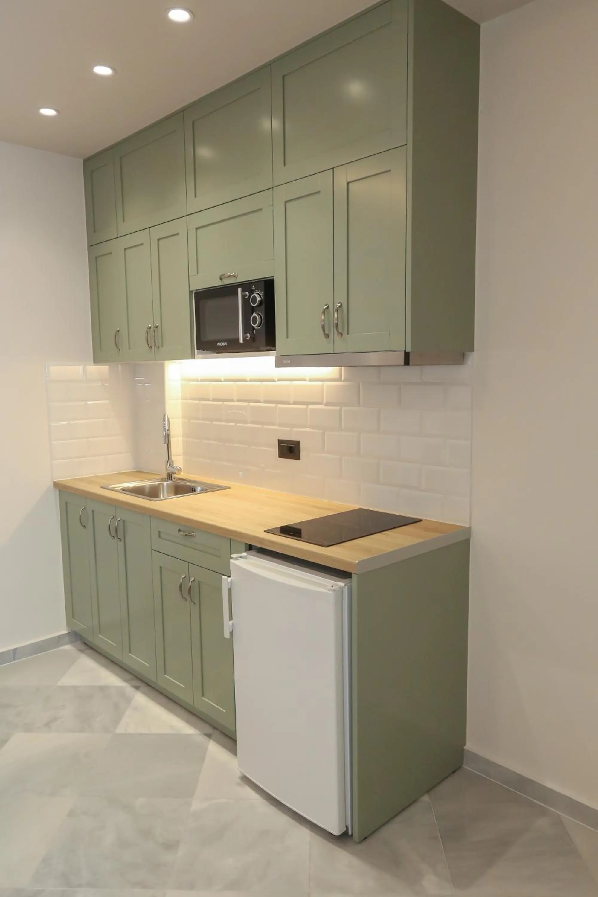 Kitchen or kitchenette in Heaven Apartments