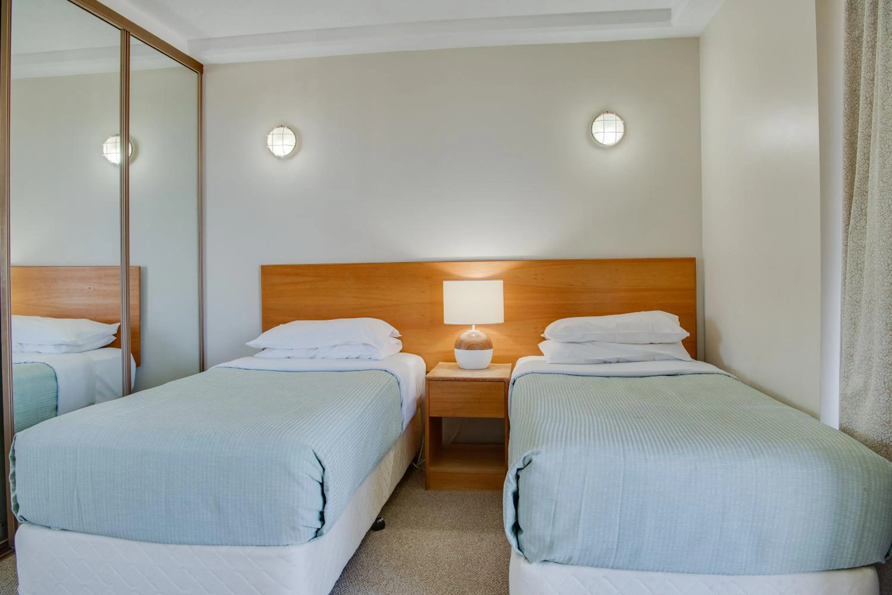 Bedroom, Bed in The Rocks Resort - Official