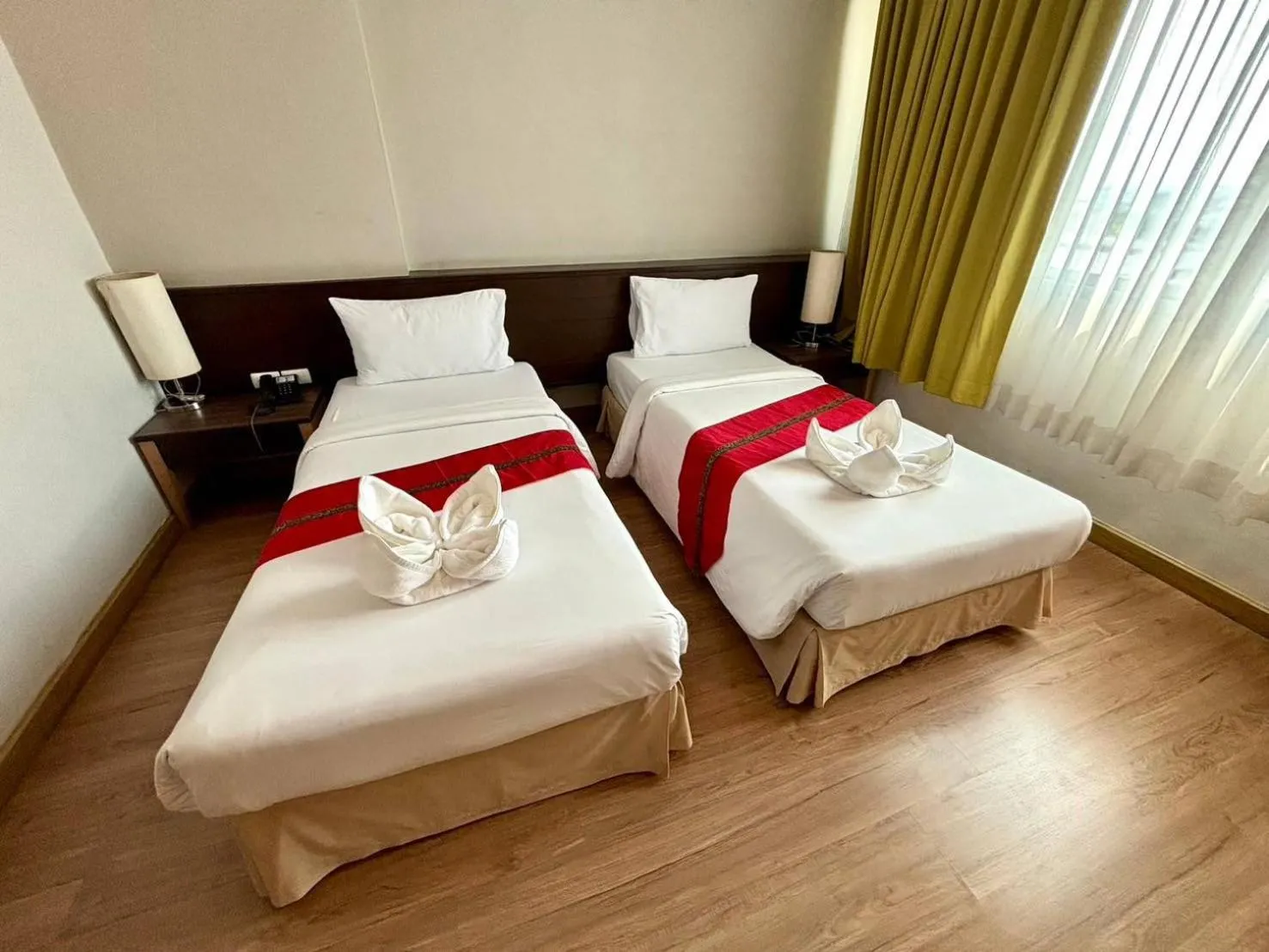 Bed in Aloha Hatyai Hotel