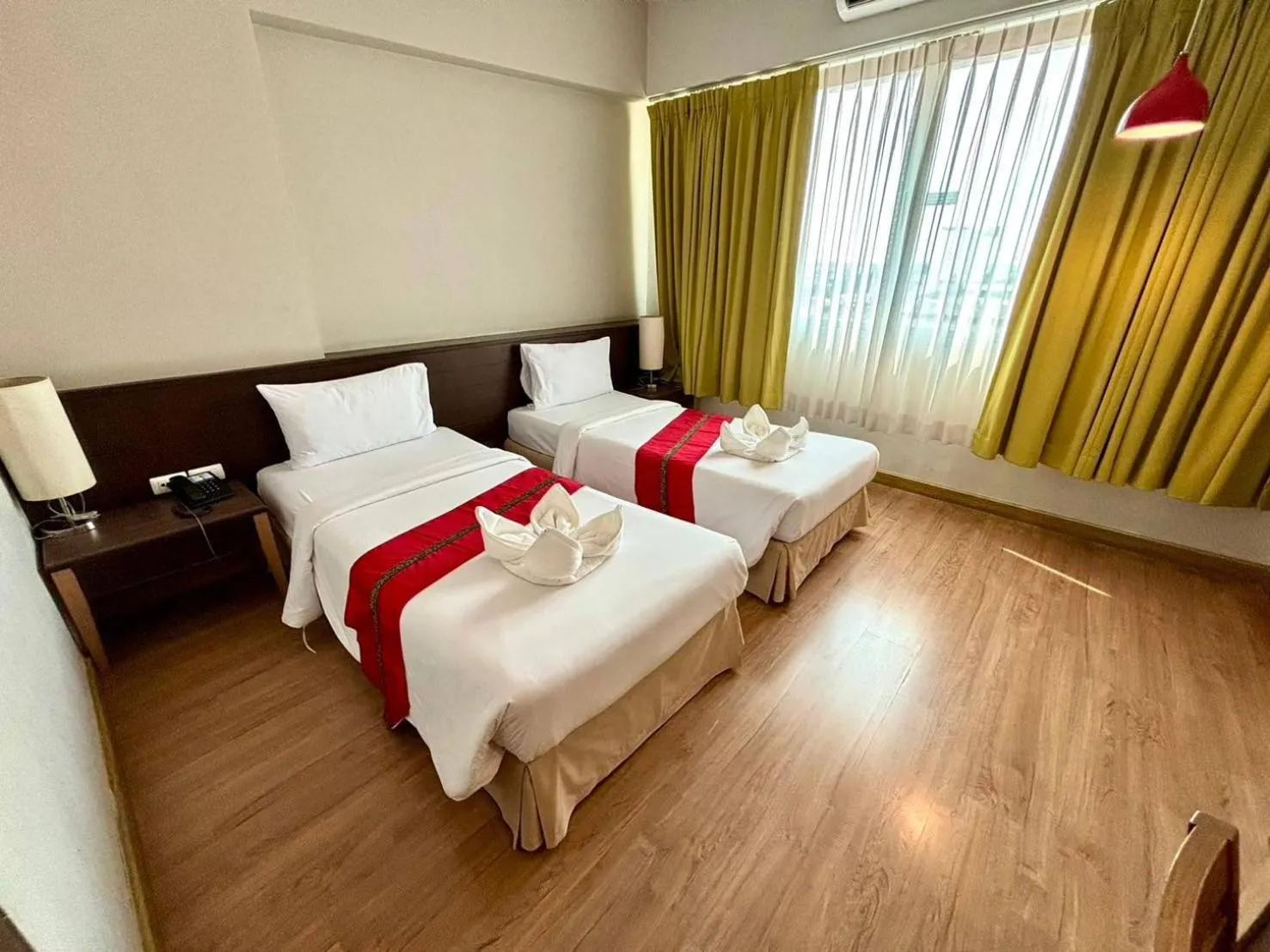 Bed in Aloha Hatyai Hotel