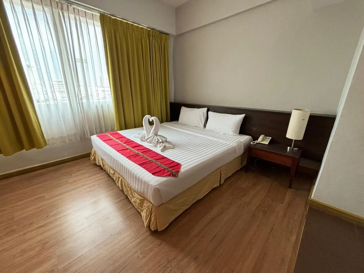 Bed in Aloha Hatyai Hotel