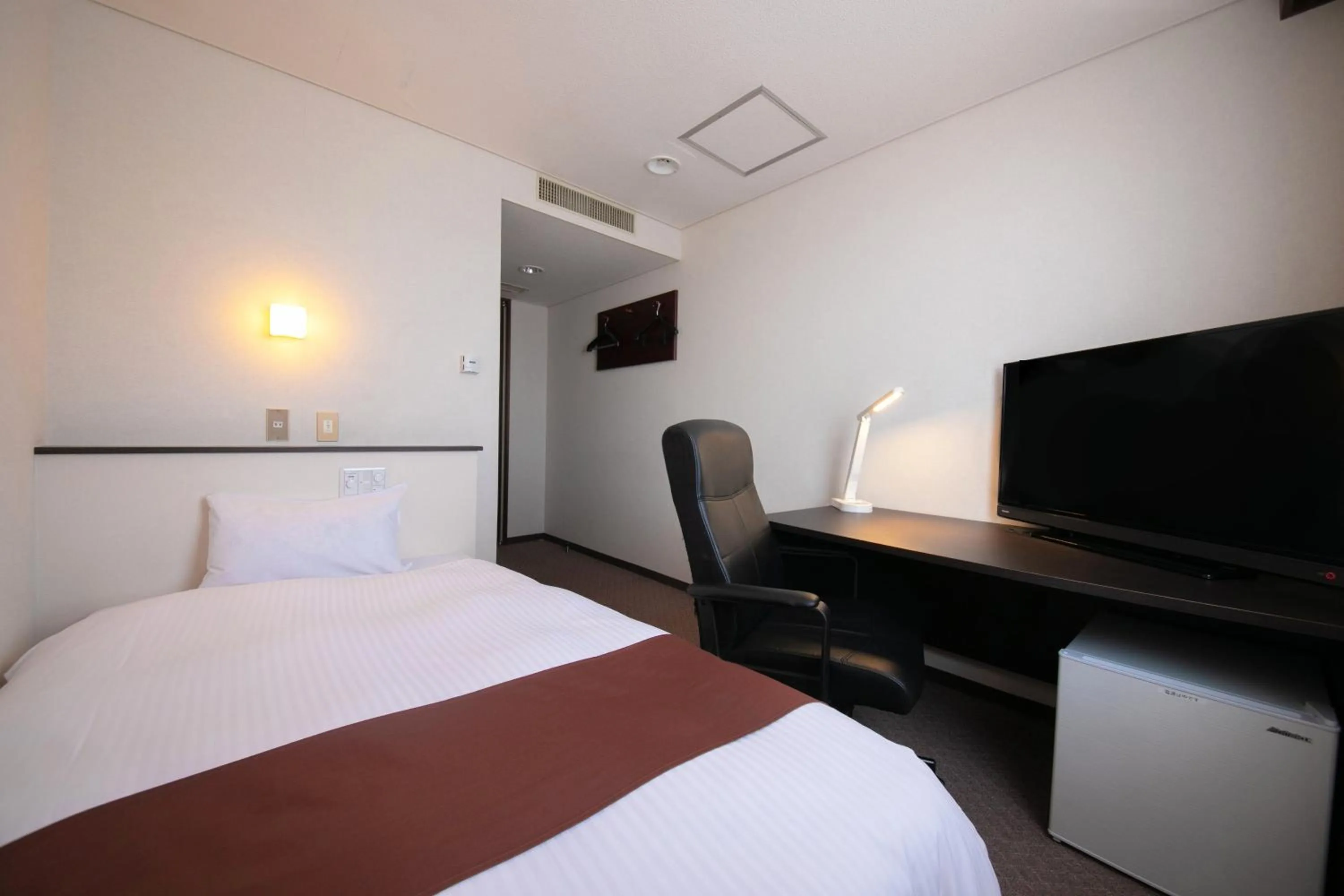 Bed in Ninohe City Hotel