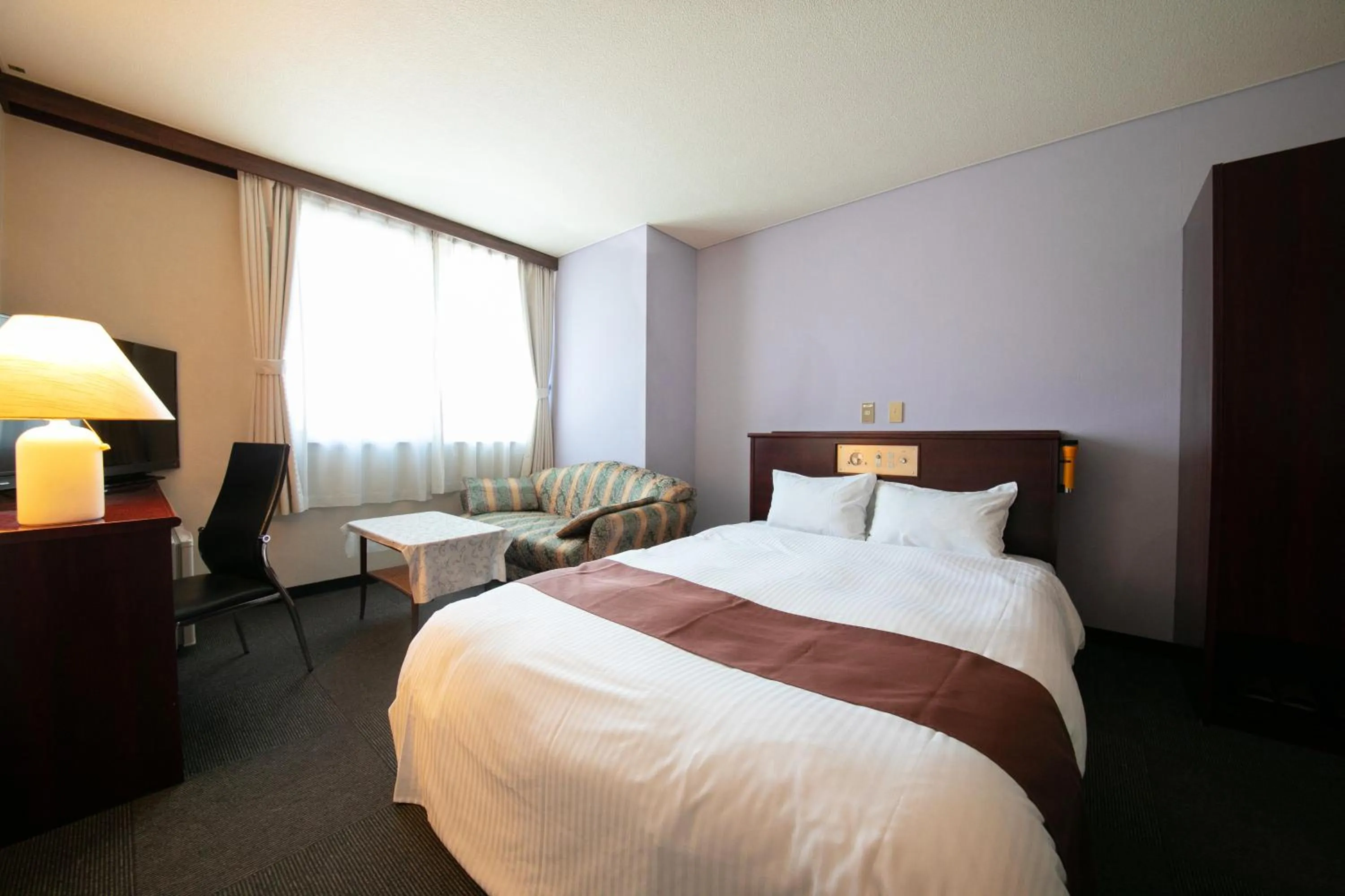 Bed in Ninohe City Hotel