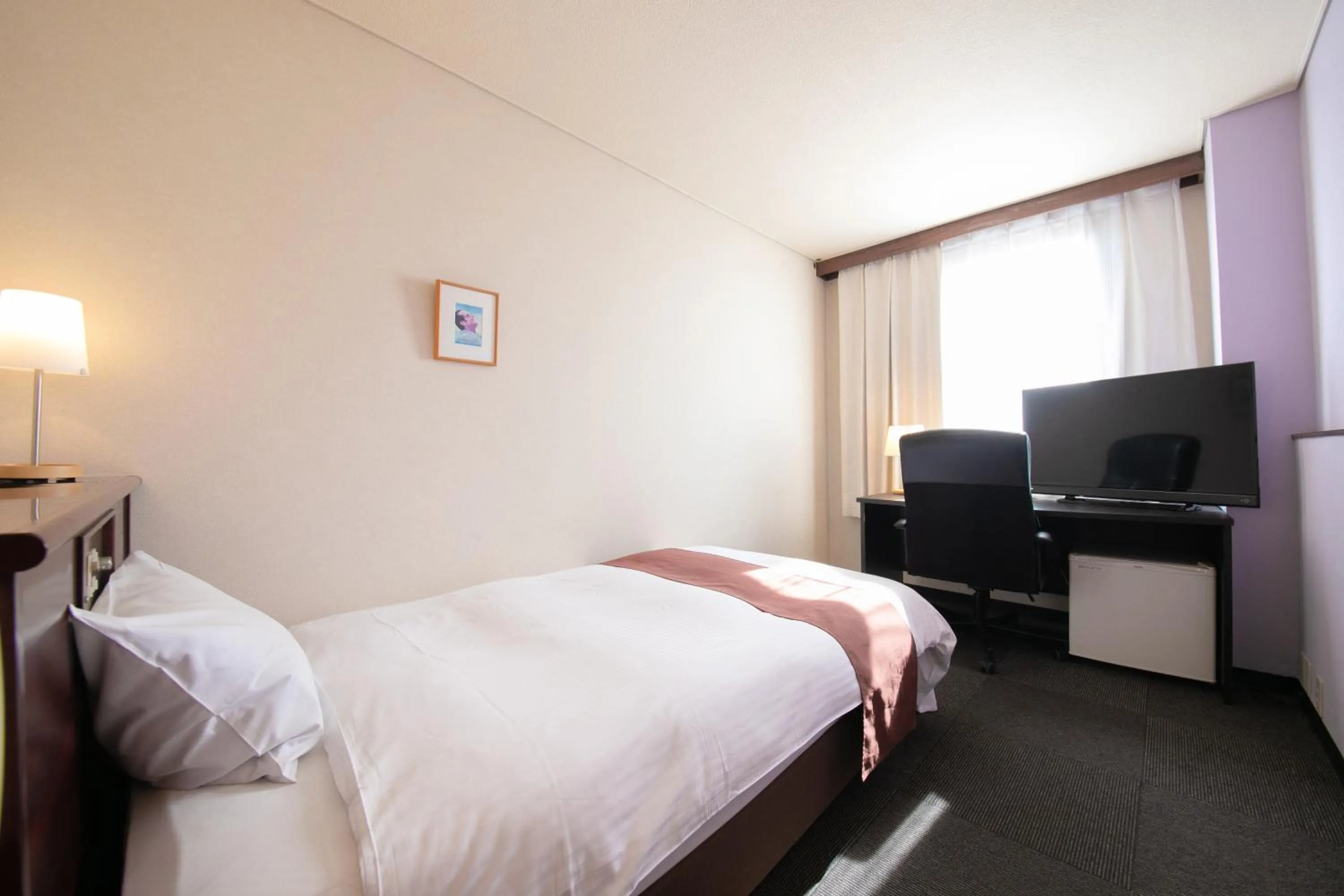 Bed in Ninohe City Hotel