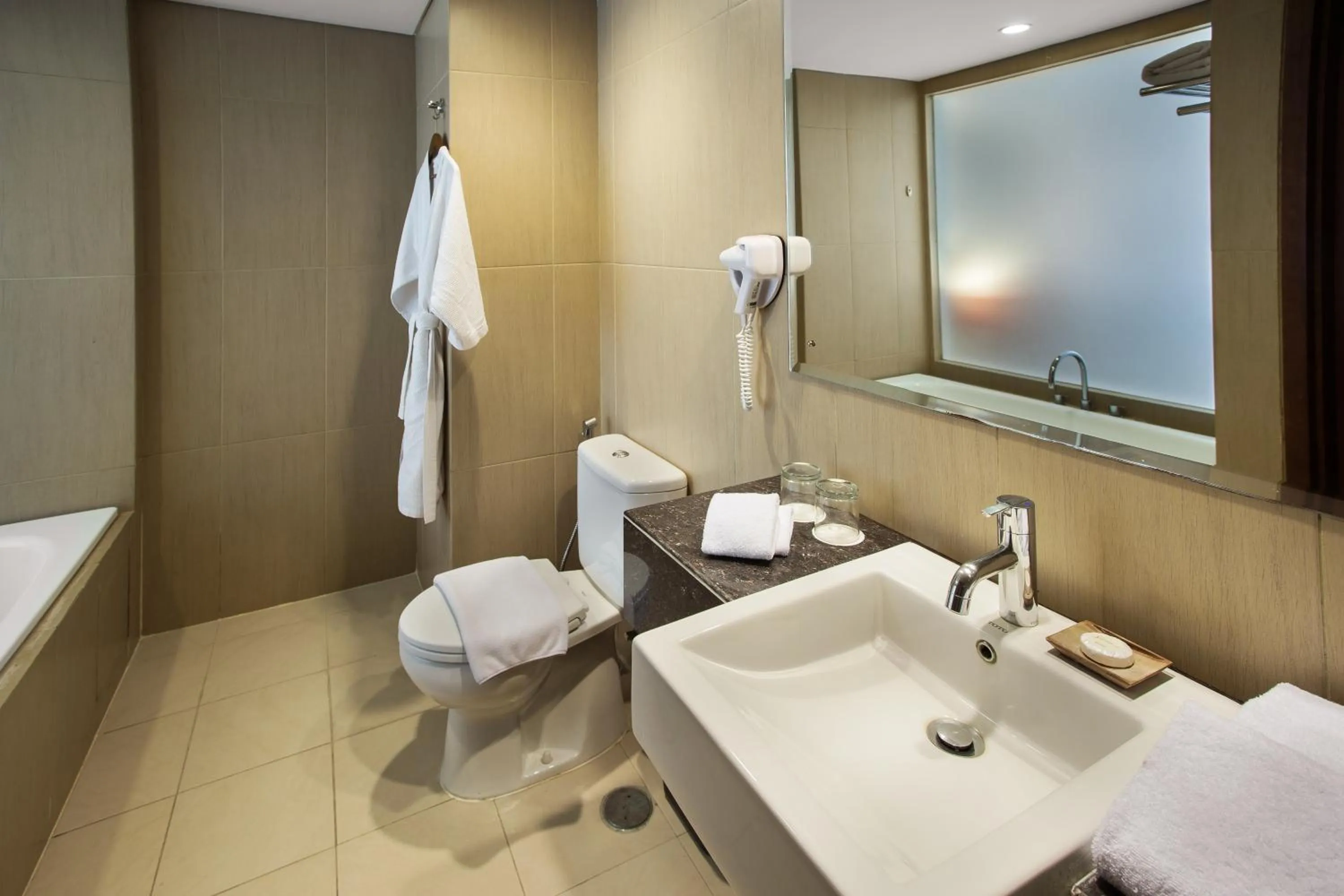 Bathroom in Sense Sunset Hotel Seminyak