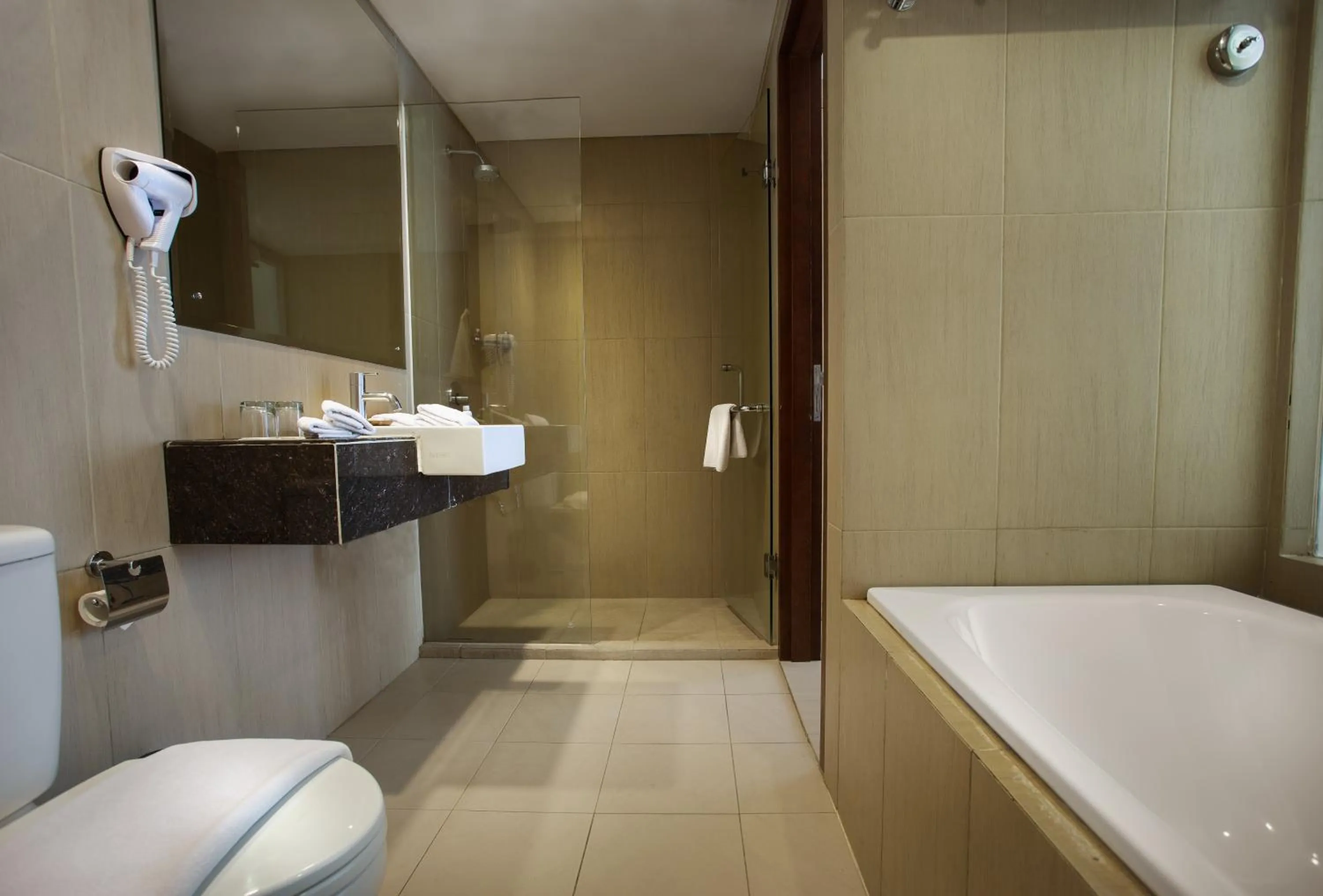 Bathroom in Sense Sunset Hotel Seminyak