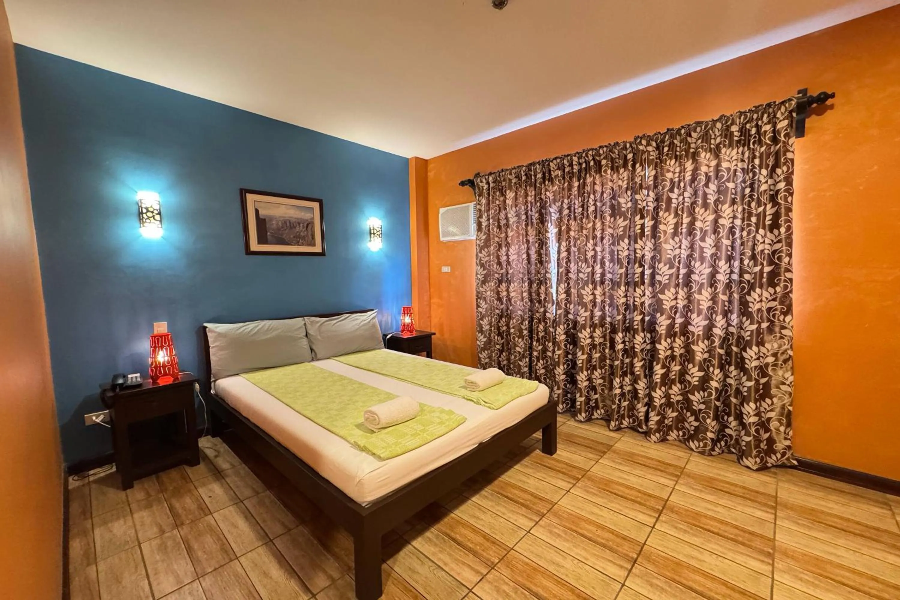 Bed in OveMar Resort Hotel near Vigan