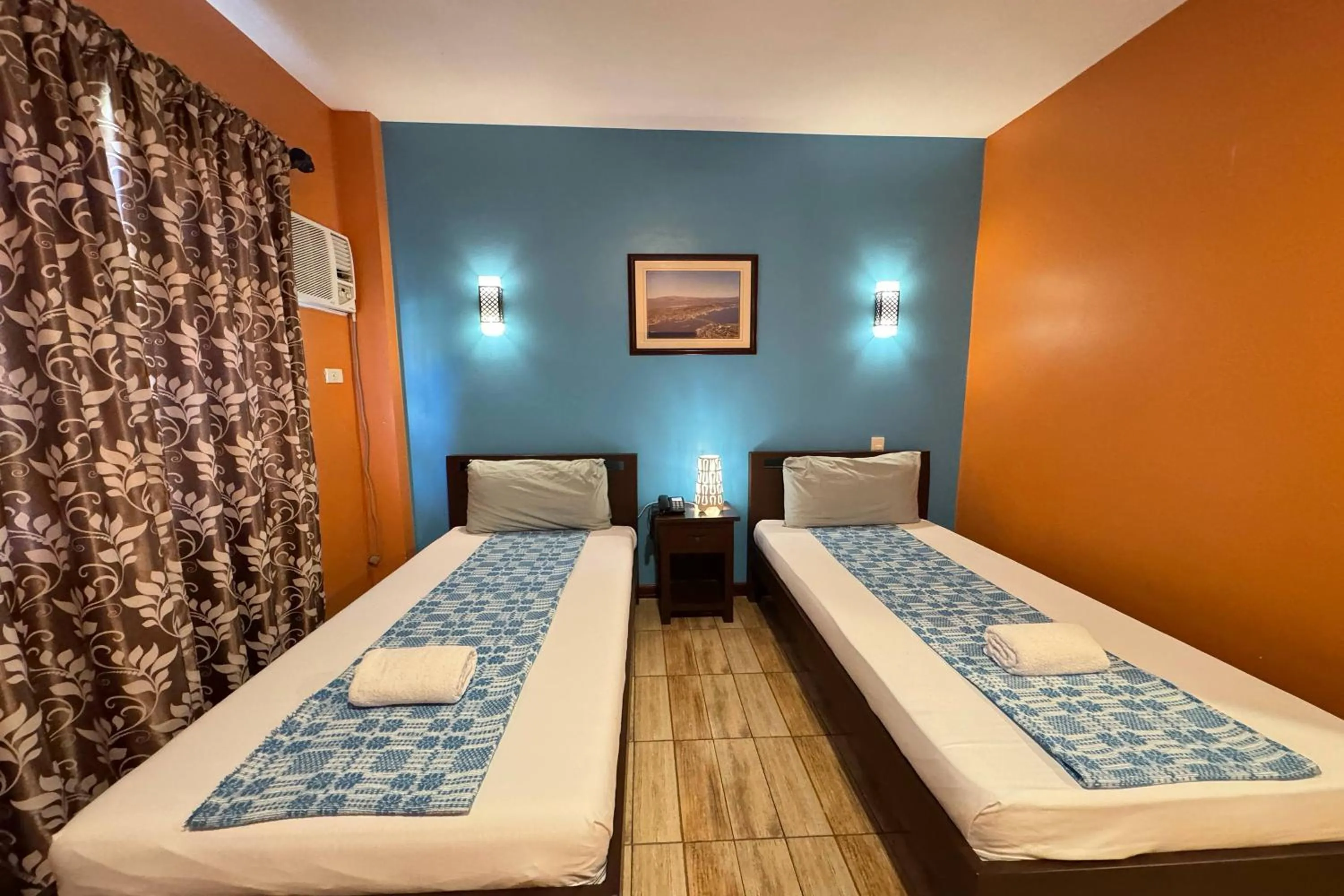 Photo of the whole room, Bed in OveMar Resort Hotel near Vigan