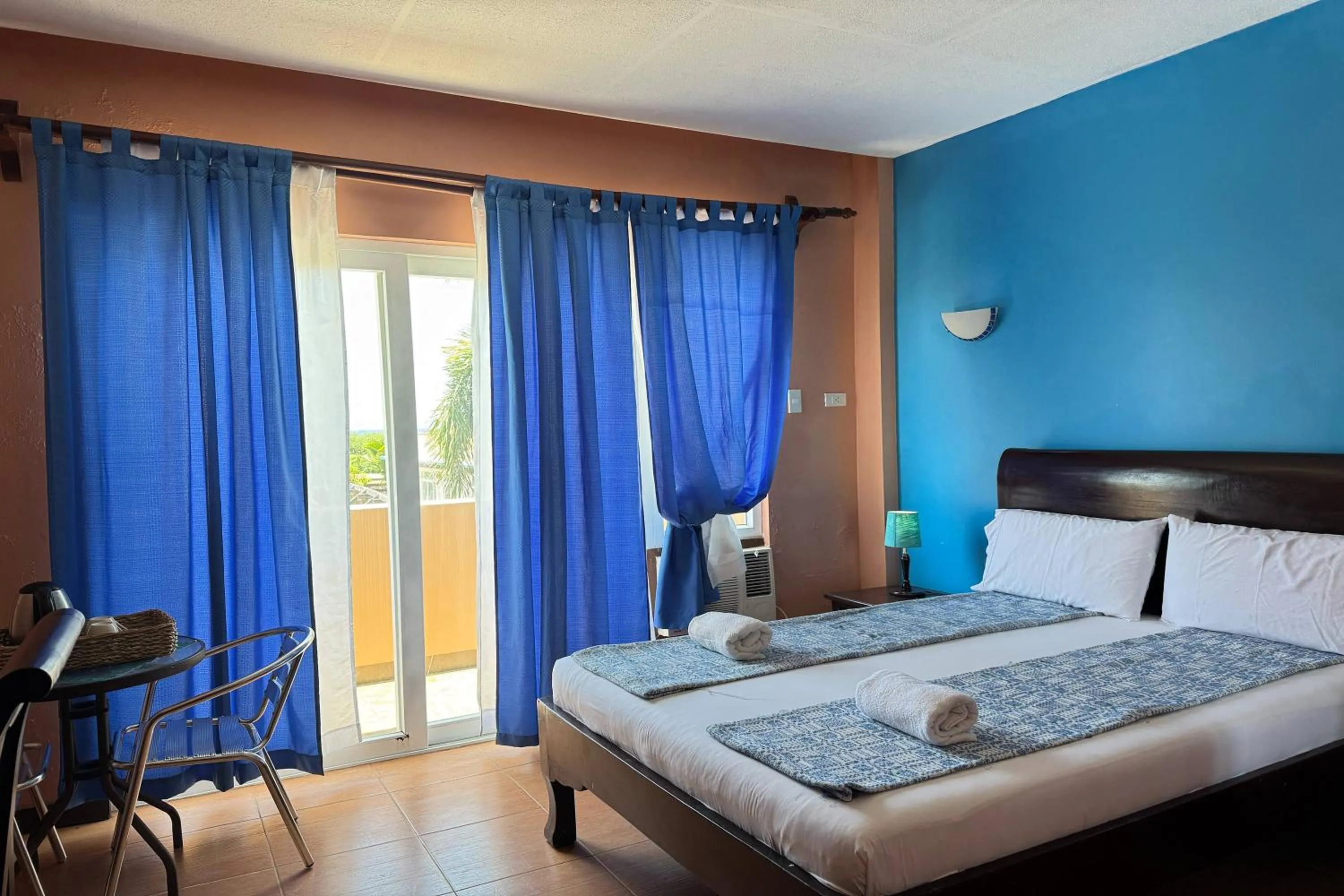 Bed in OveMar Resort Hotel near Vigan