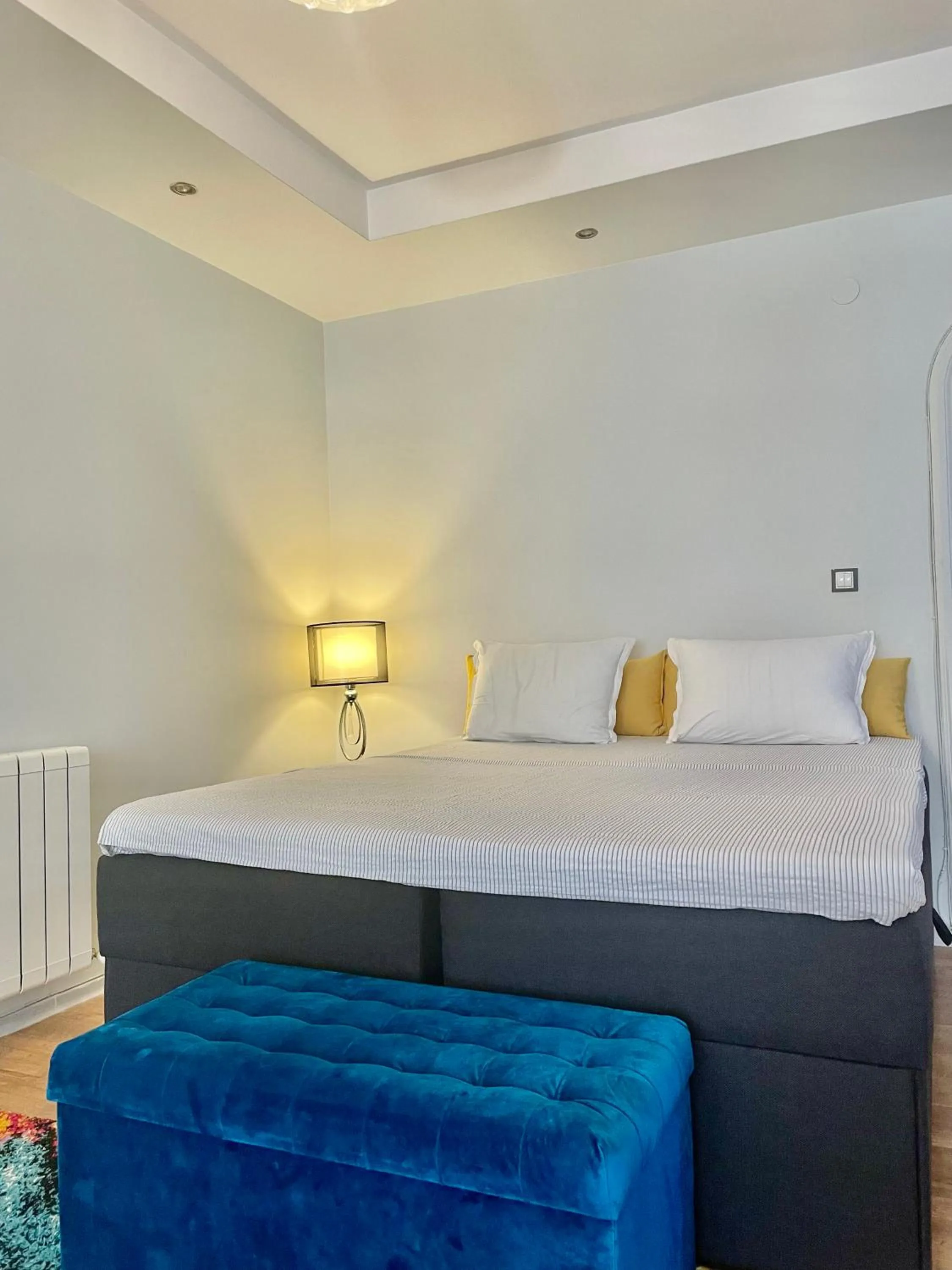 Bed in White Rose Guest Rooms