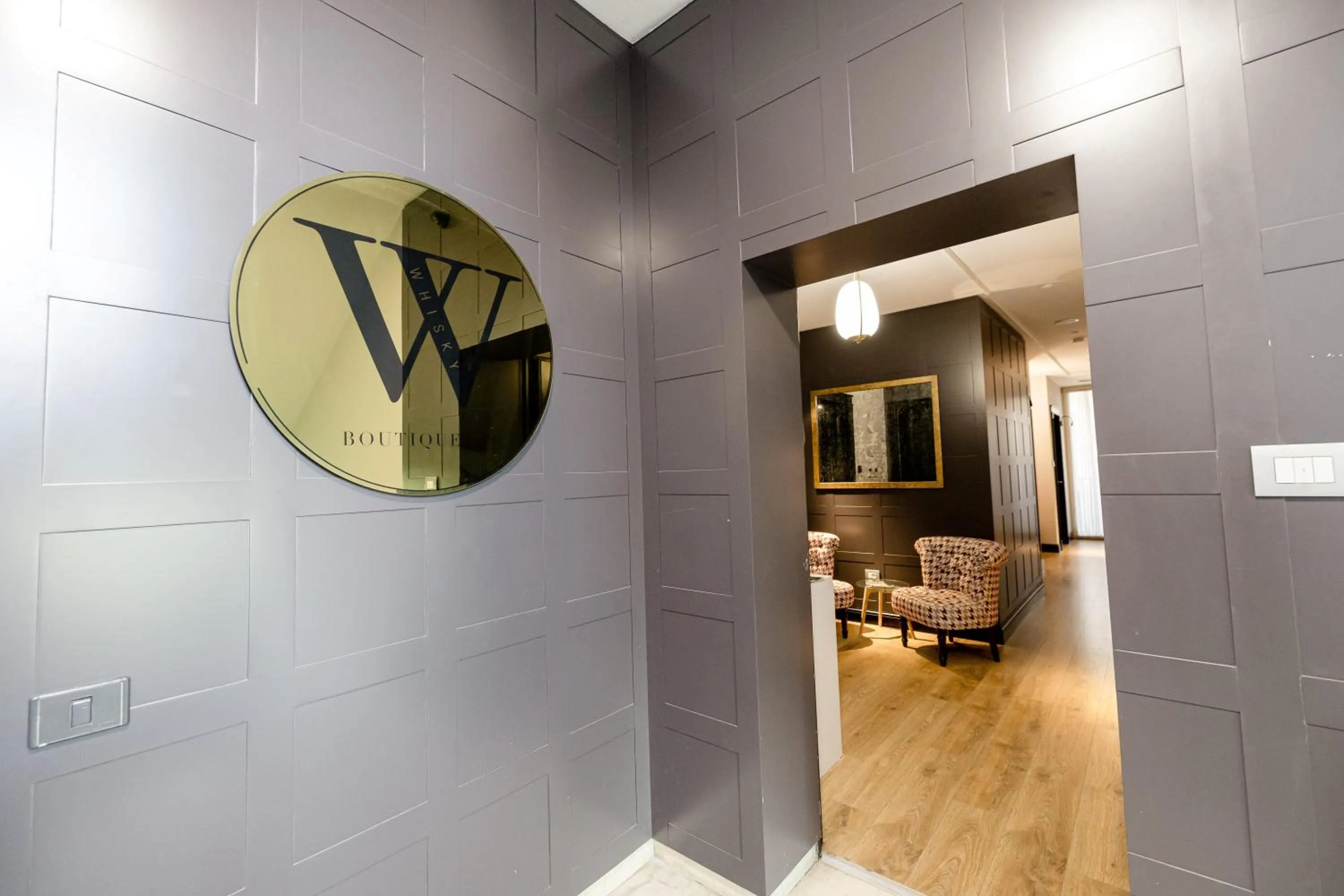 Property logo or sign in Boutique Hotel Whisky