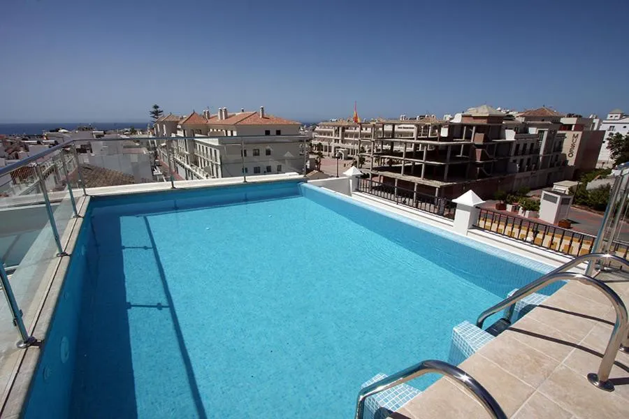 Swimming pool in Apartamentos La Botica de Nerja