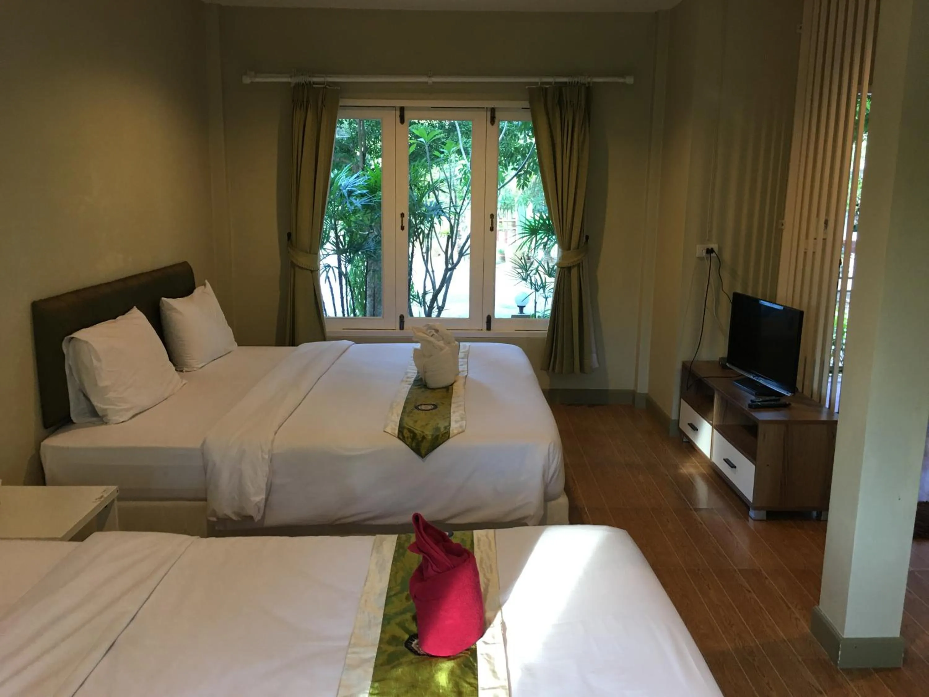 Bed in Siriburi Resort