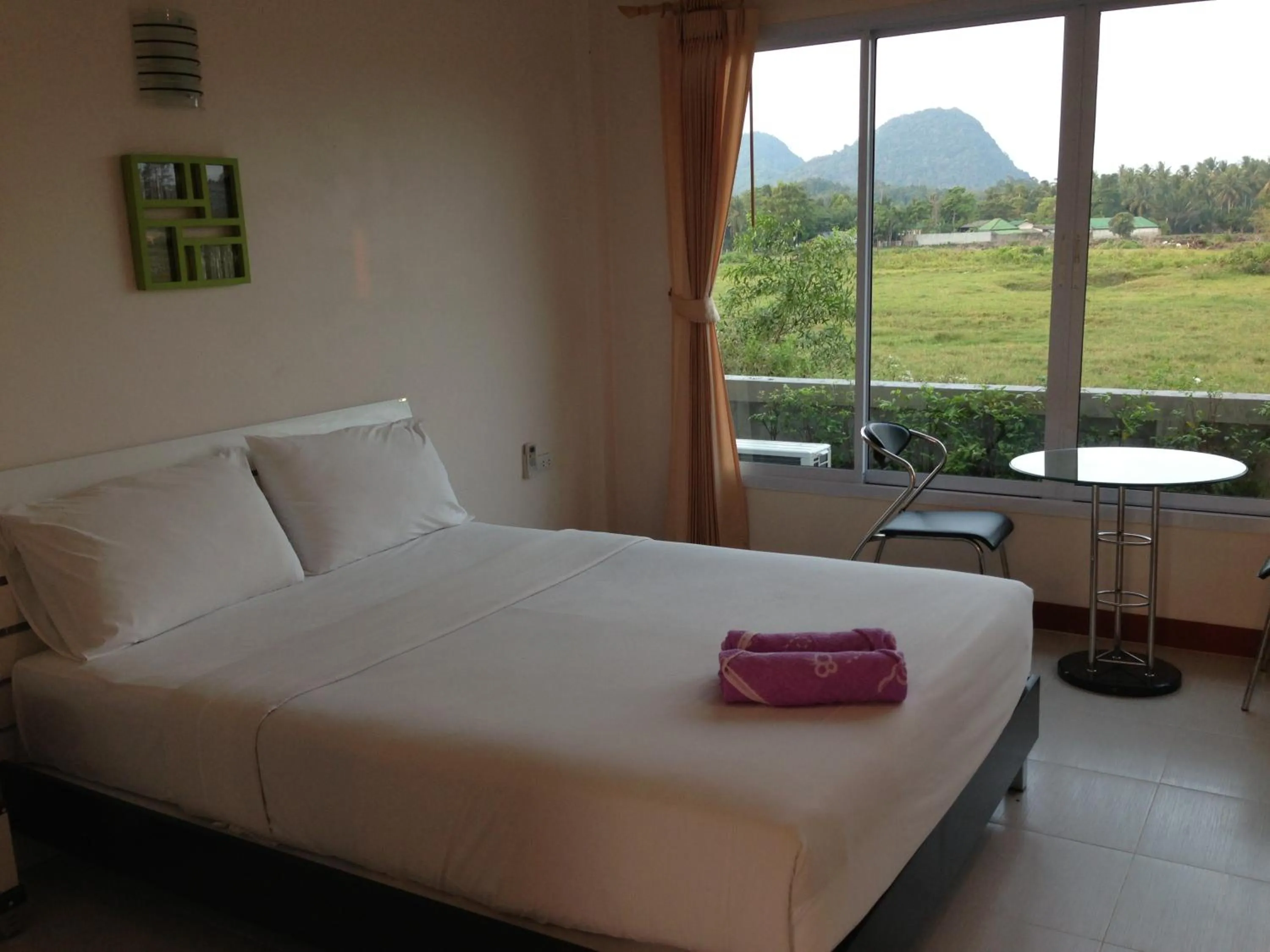 Bed in Siriburi Resort