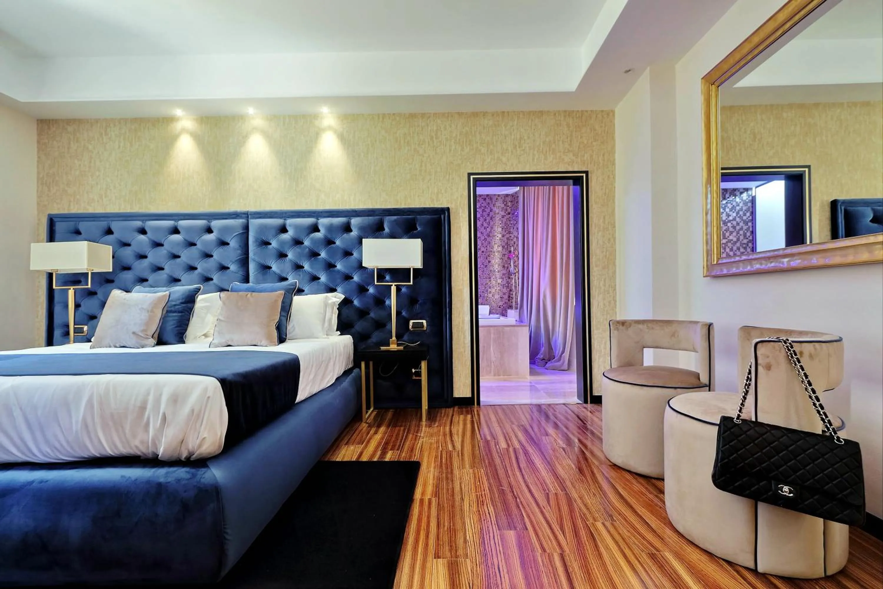 Bed in Spanish Diamond Luxury Suites & Jacuzzi