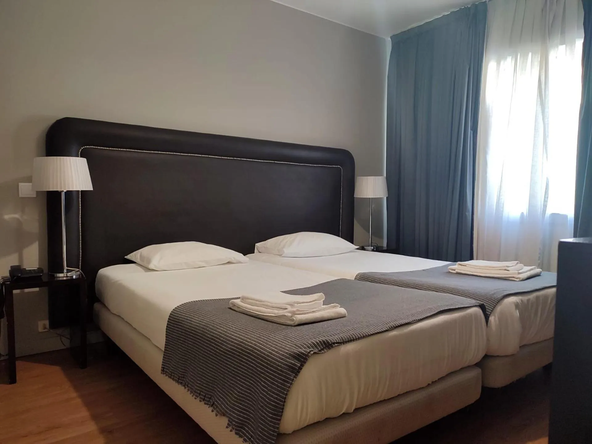 Bed in Vila Hotel By VimaHotels