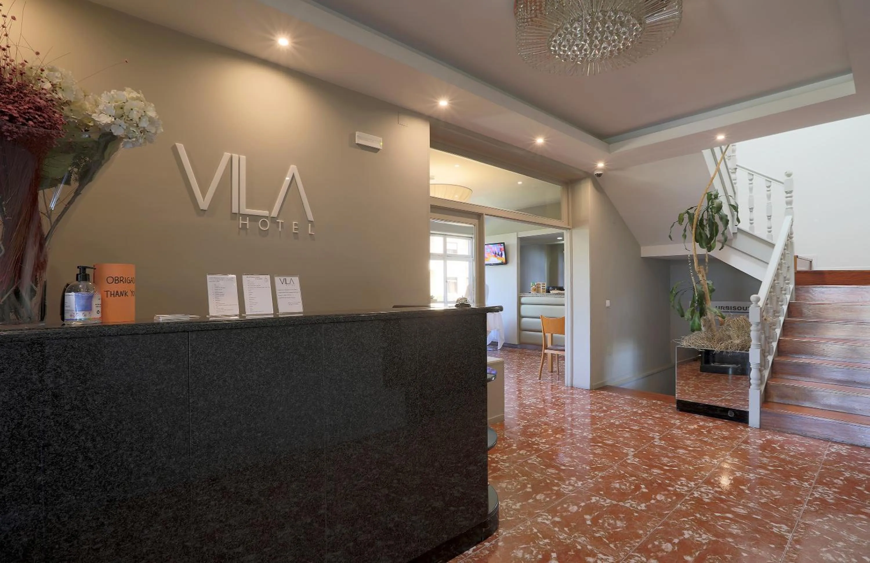 Lobby or reception in Vila Hotel By VimaHotels