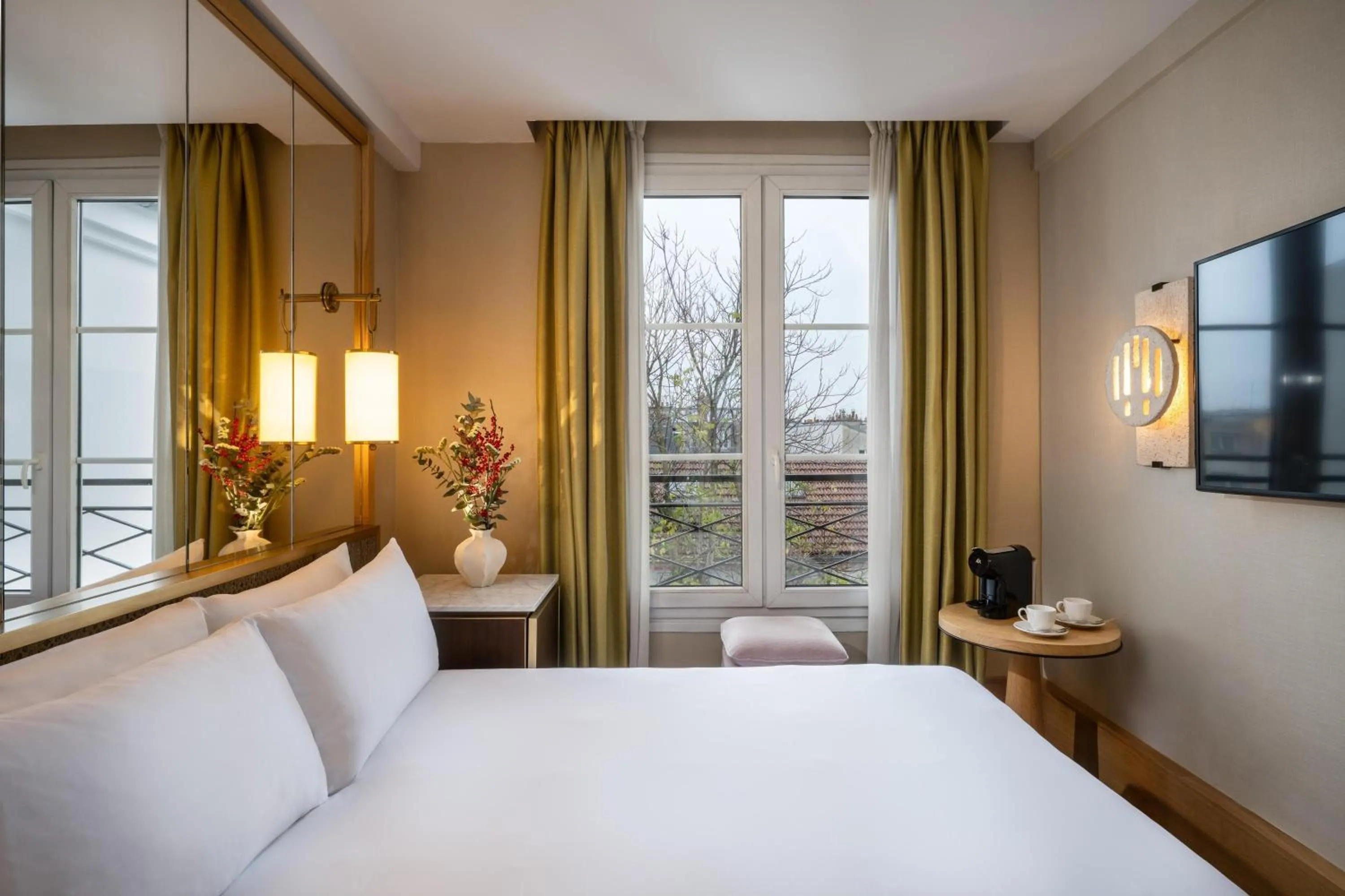 Bed in Le Belgrand Hotel Paris Champs Elysees, Tapestry By Hilton