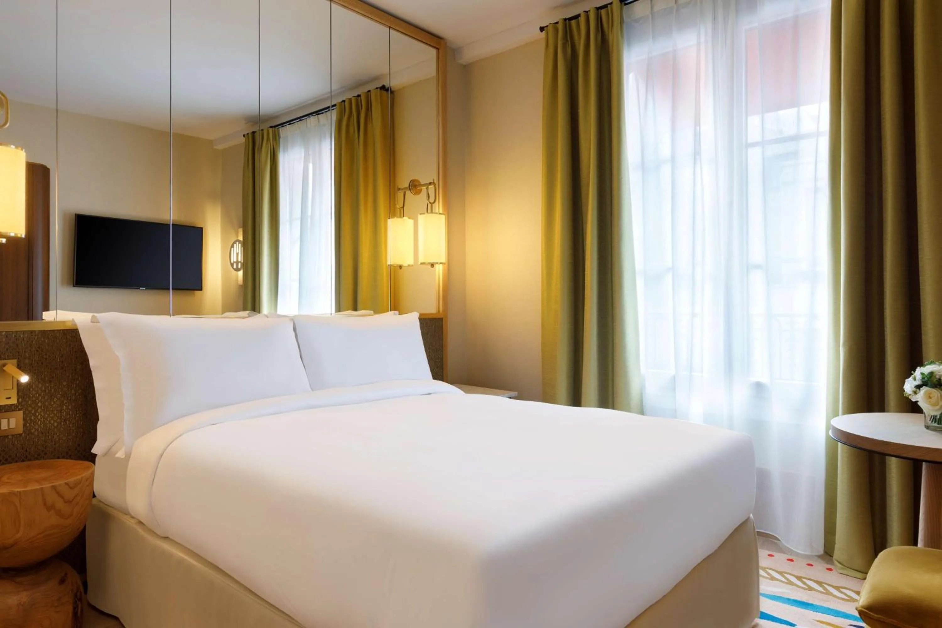 Bed in Le Belgrand Hotel Paris Champs Elysees, Tapestry By Hilton