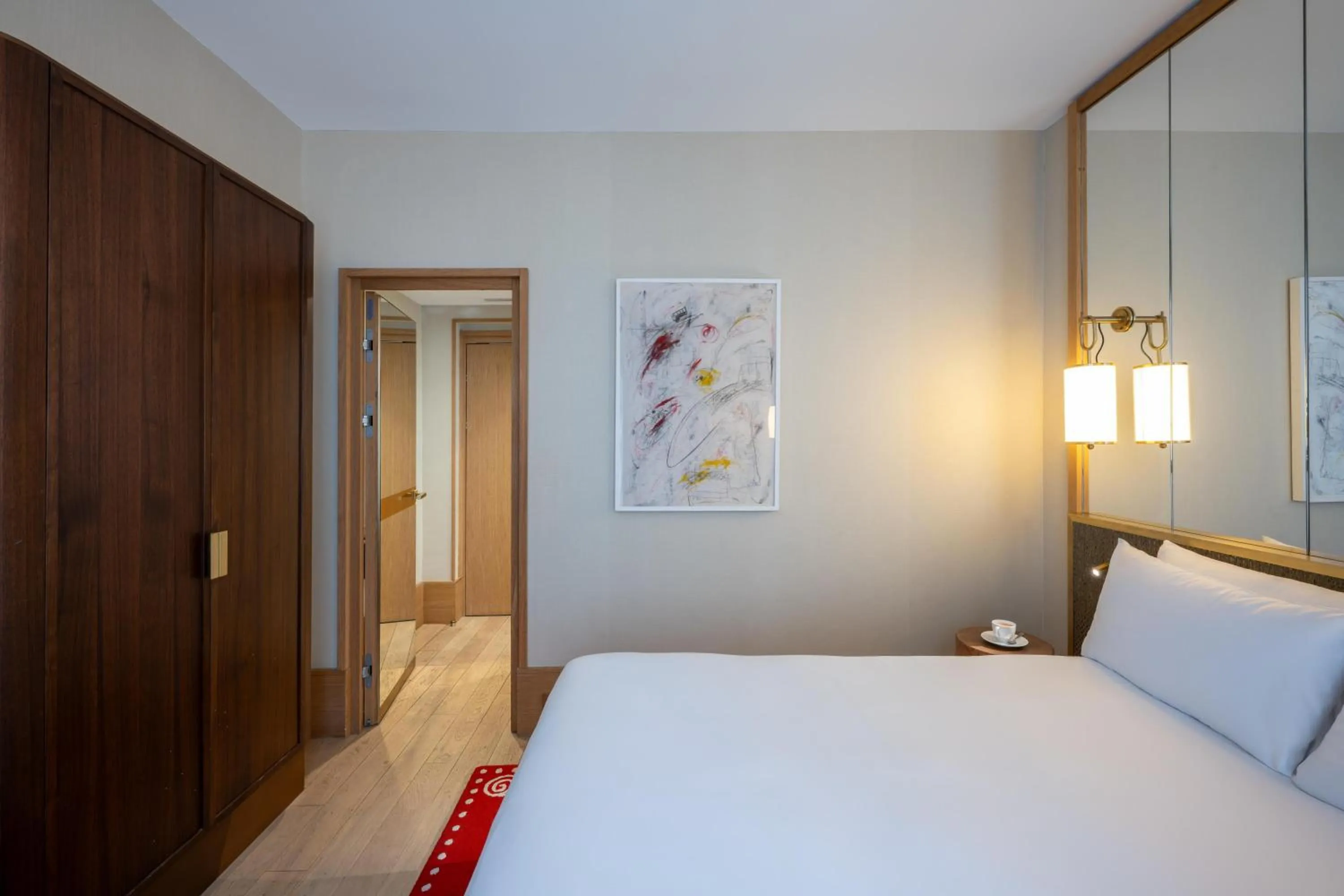 Bed in Le Belgrand Hotel Paris Champs Elysees, Tapestry By Hilton