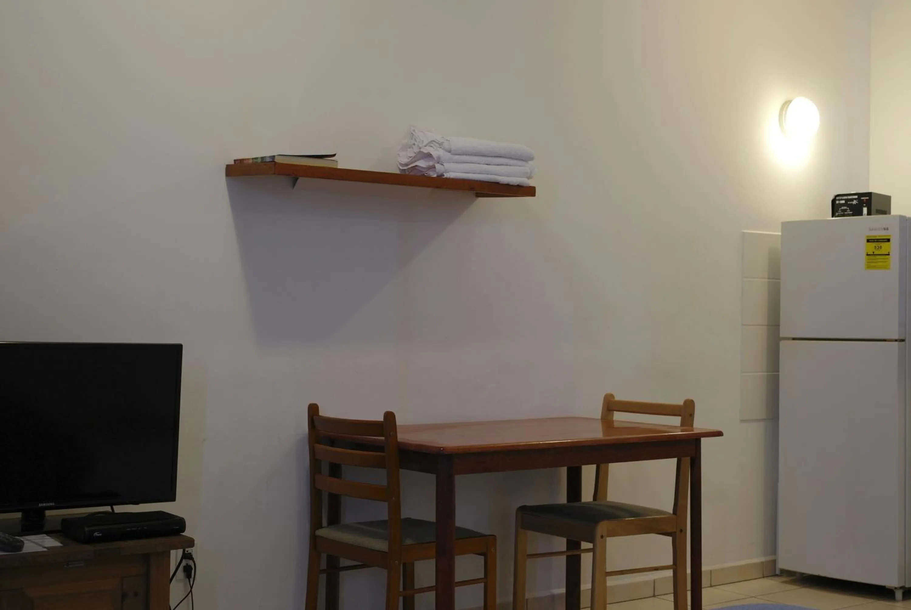 TV and multimedia in Orange Rembrandt Studio Apartments