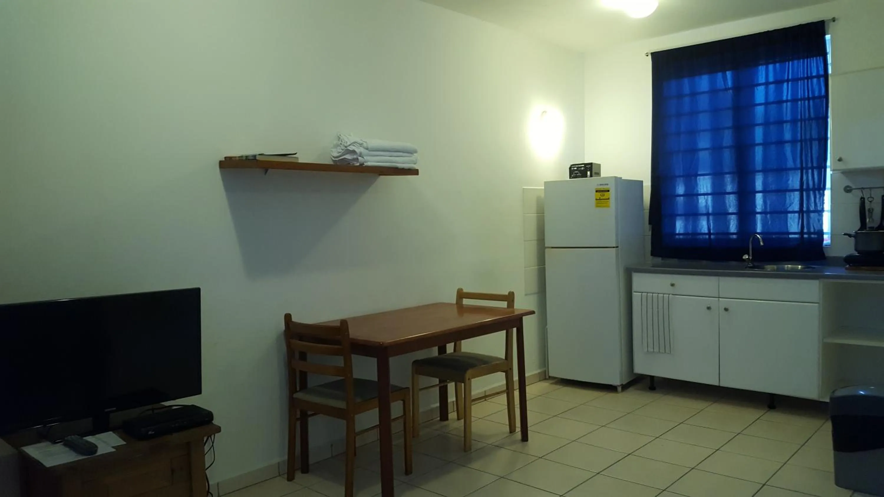 Dining area in Orange Rembrandt Studio Apartments
