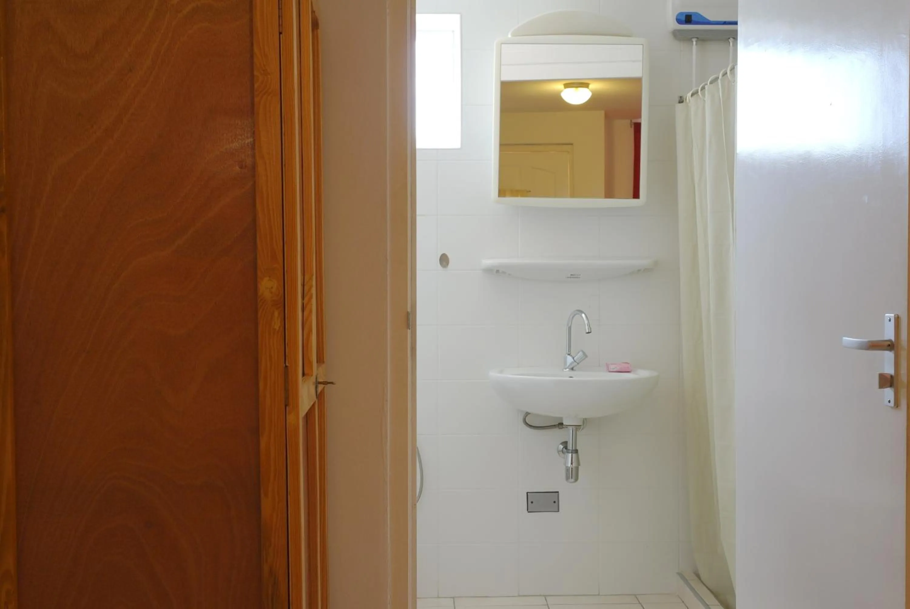 Toilet in Orange Rembrandt Studio Apartments