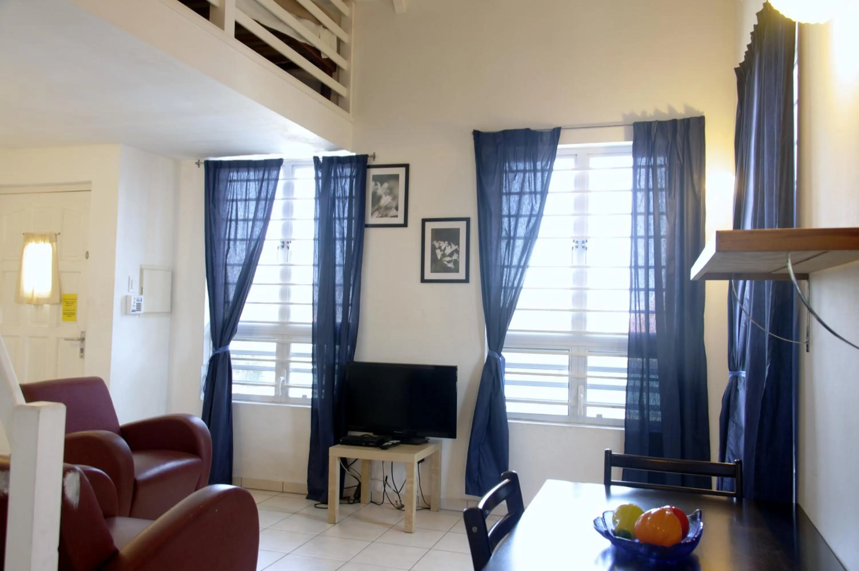 Living room in Orange Rembrandt Studio Apartments