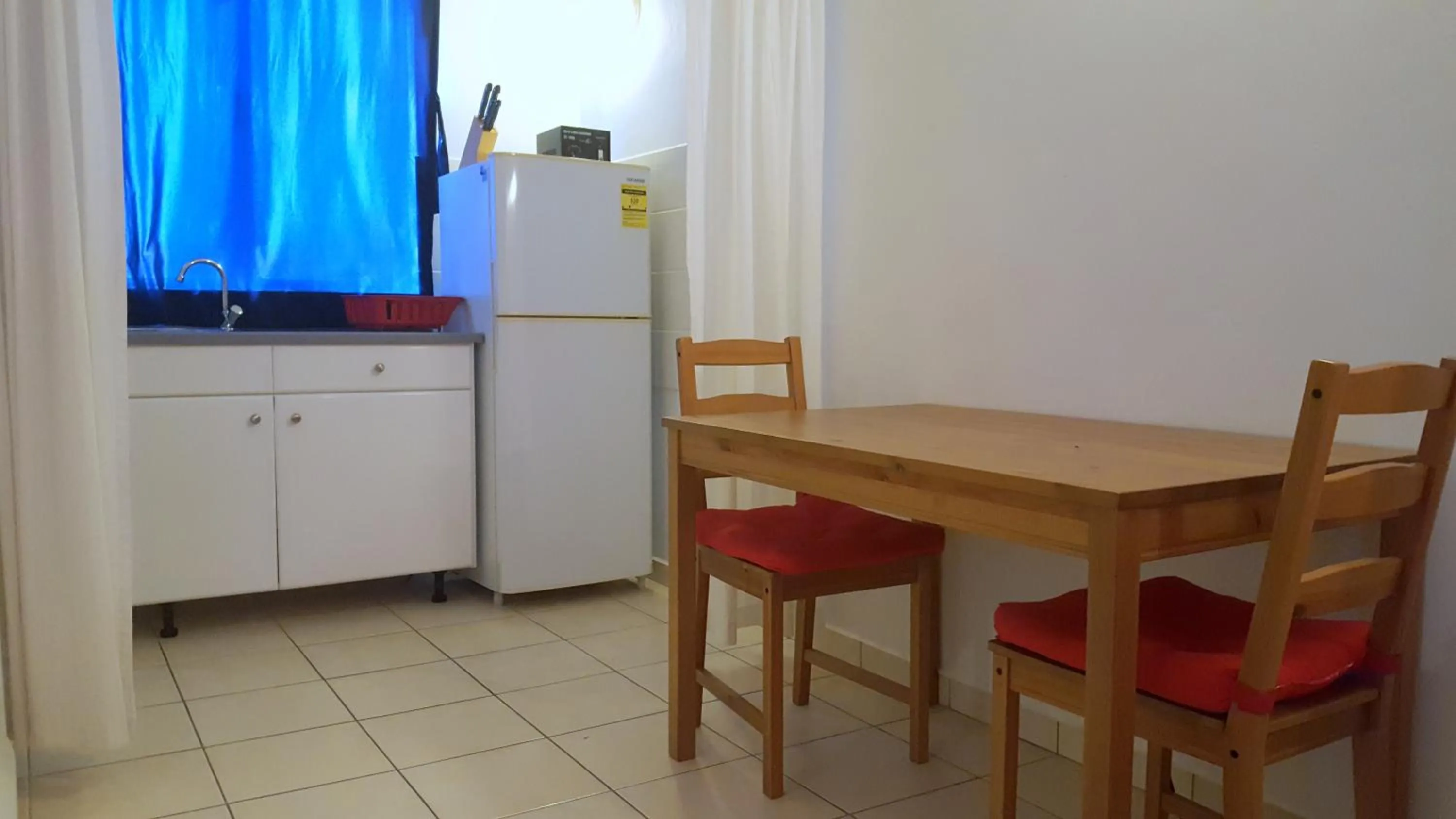Dining area in Orange Rembrandt Studio Apartments