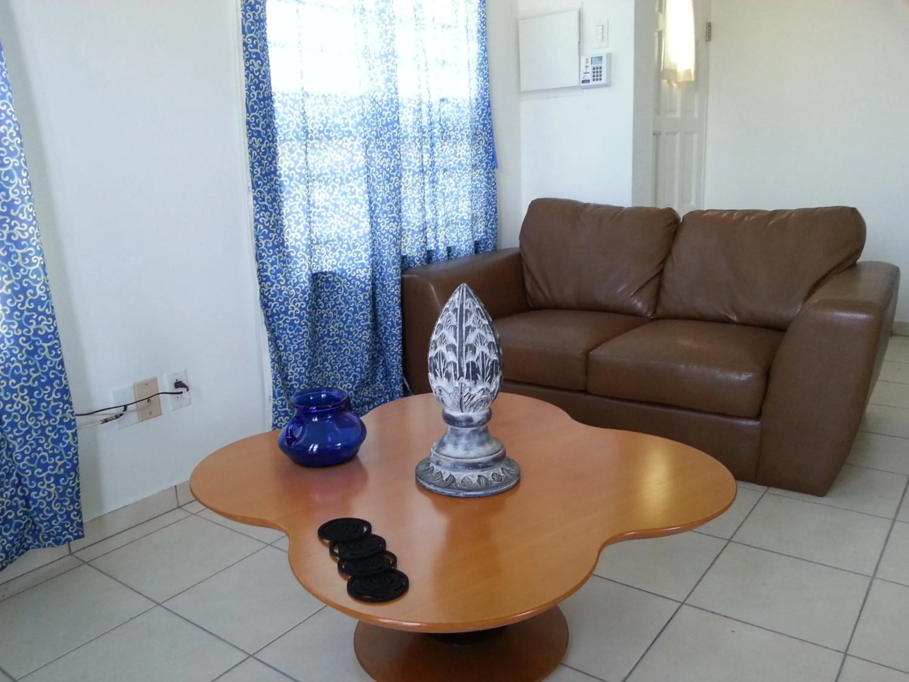 Living room in Orange Rembrandt Studio Apartments
