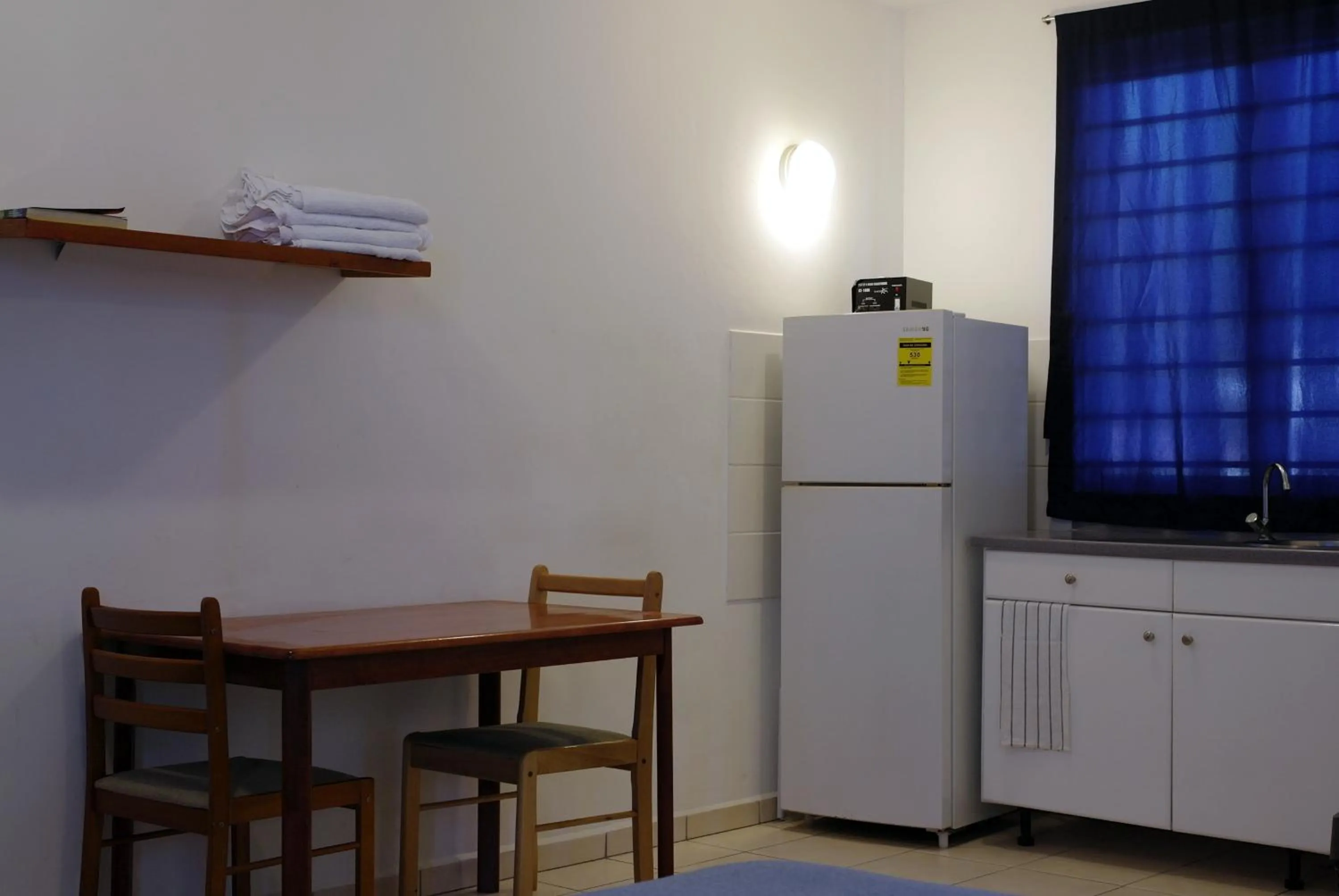 Dining area in Orange Rembrandt Studio Apartments