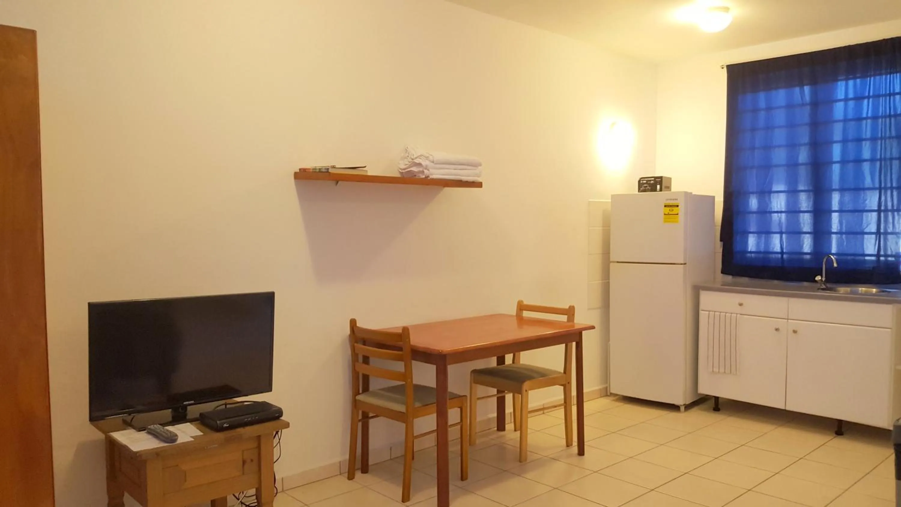 Photo of the whole room in Orange Rembrandt Studio Apartments