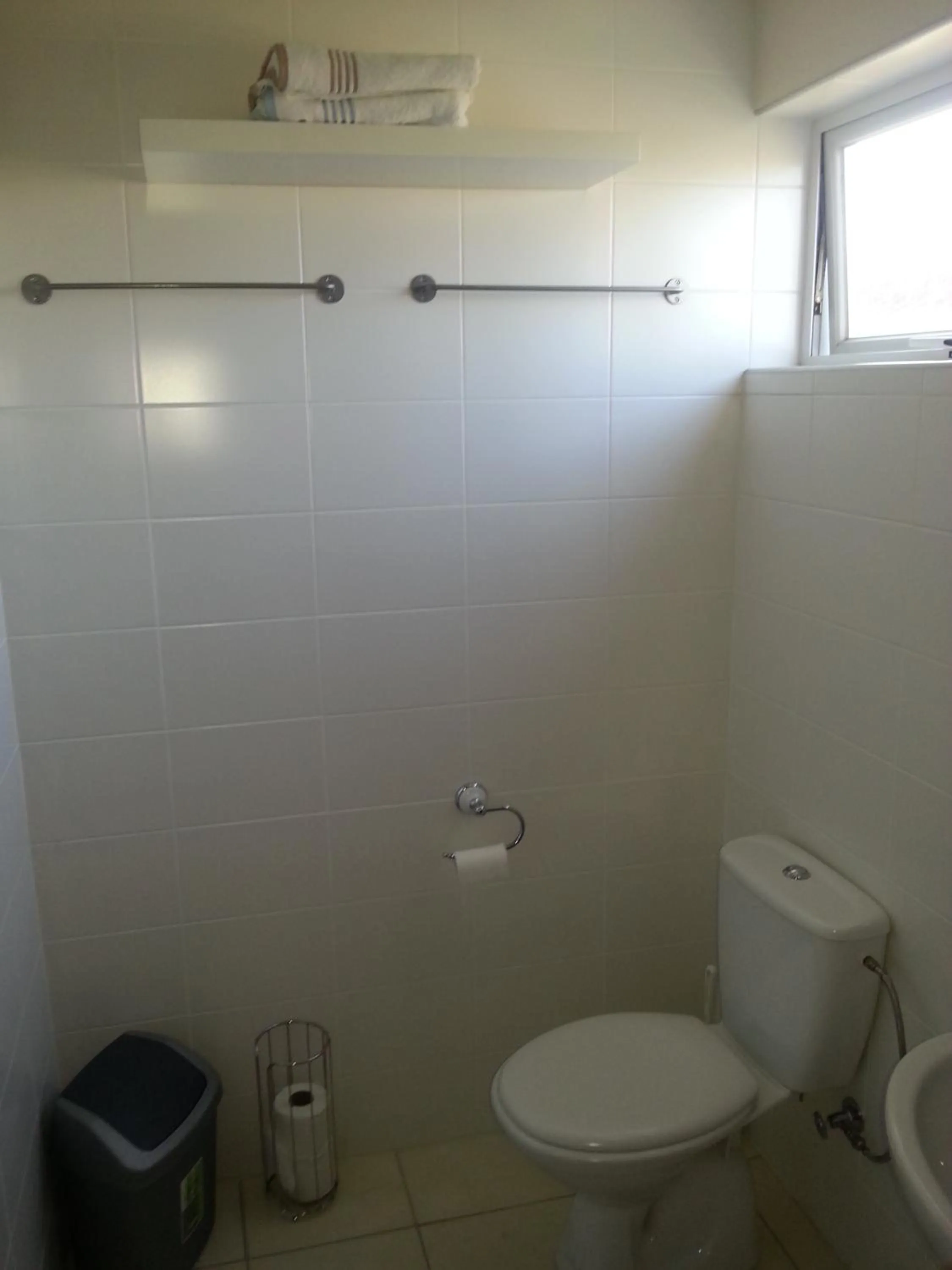 Toilet in Orange Rembrandt Studio Apartments