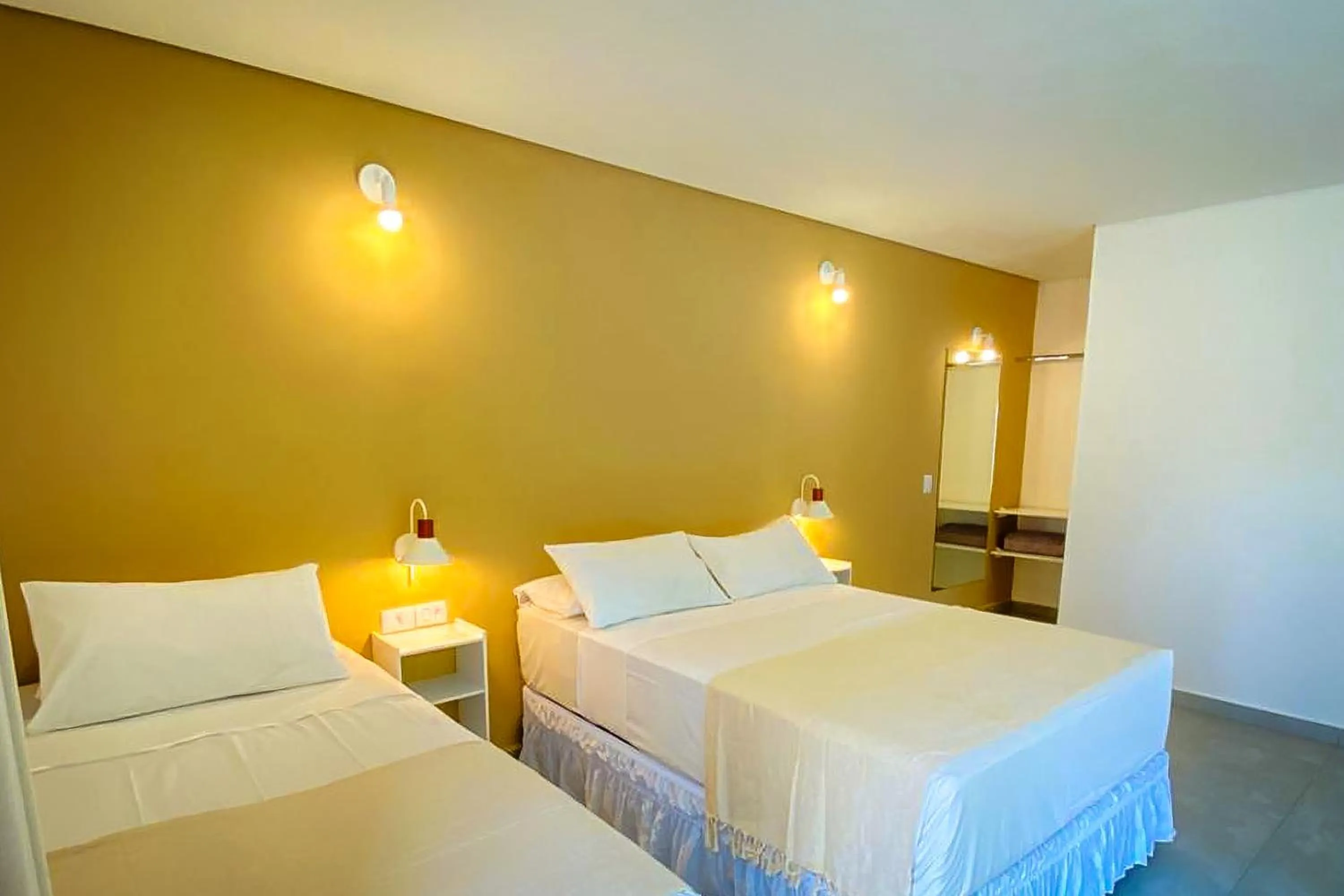 Bed in VELINN Pousada Bromelias