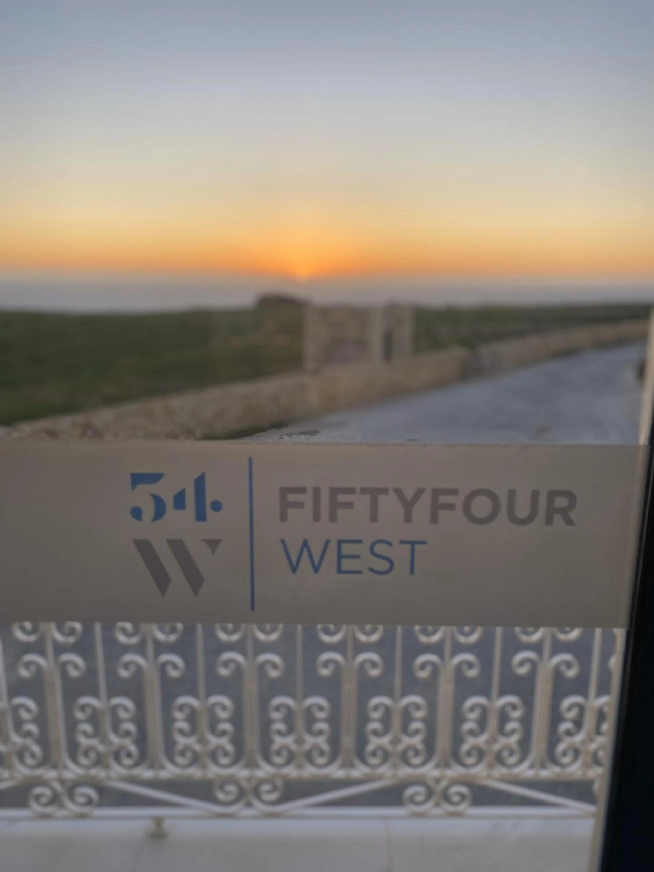 Property logo or sign in Fiftyfour West Boutique Living