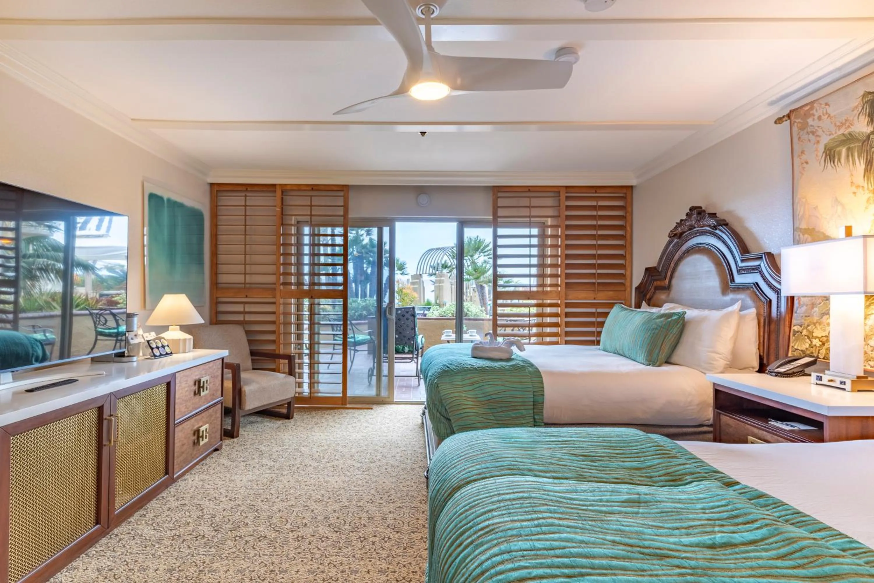 Bed in Pacific Terrace Hotel