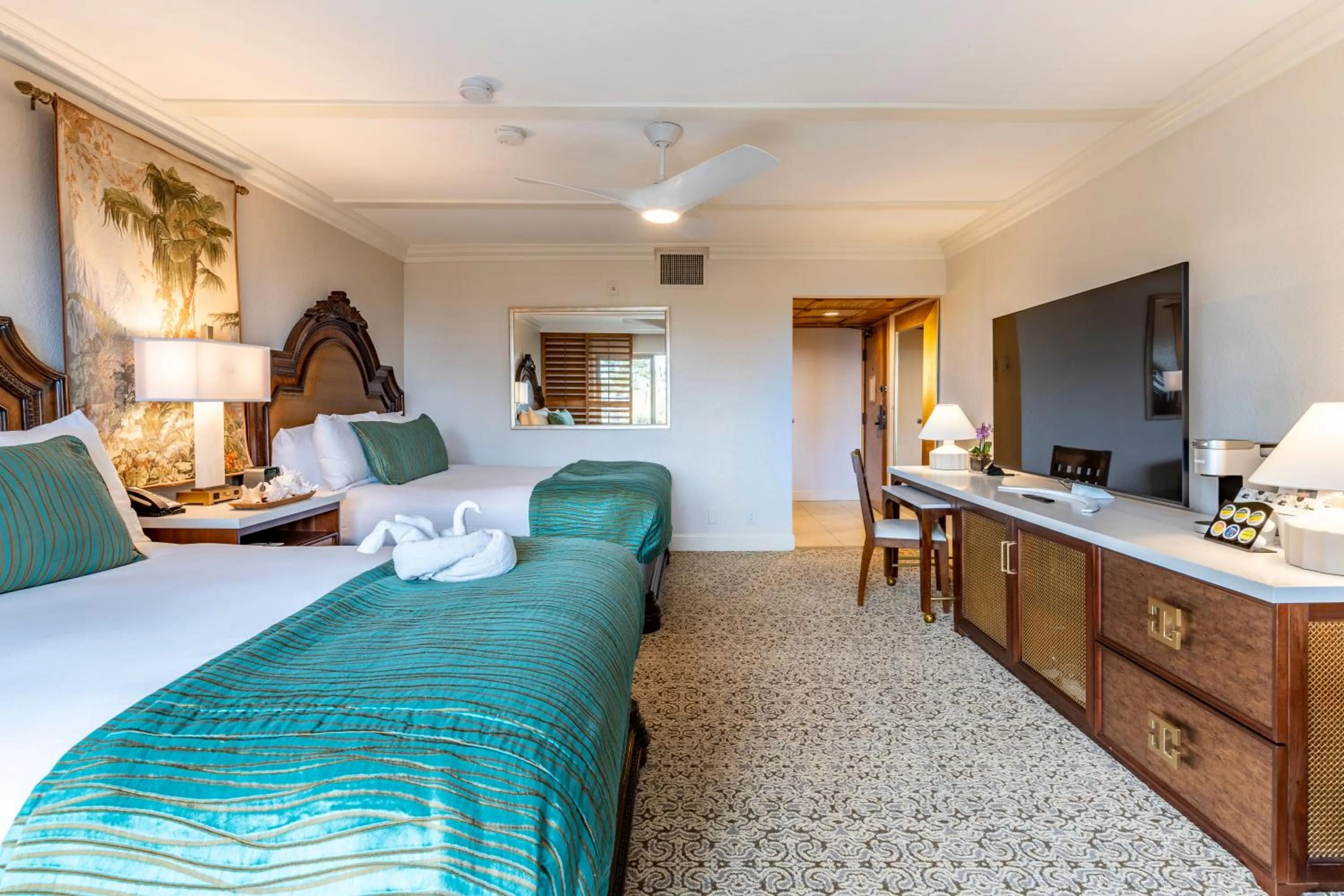 Bed in Pacific Terrace Hotel