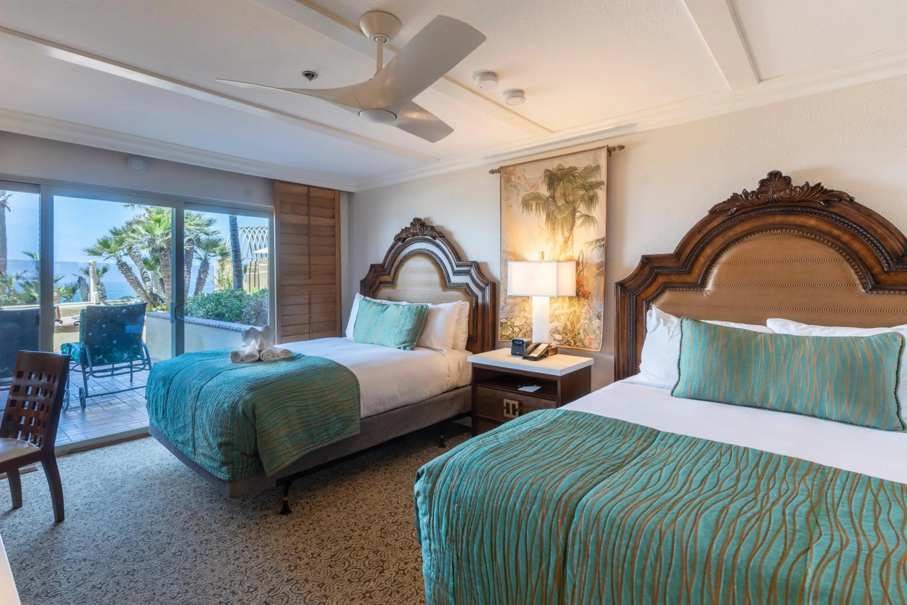 Bed in Pacific Terrace Hotel