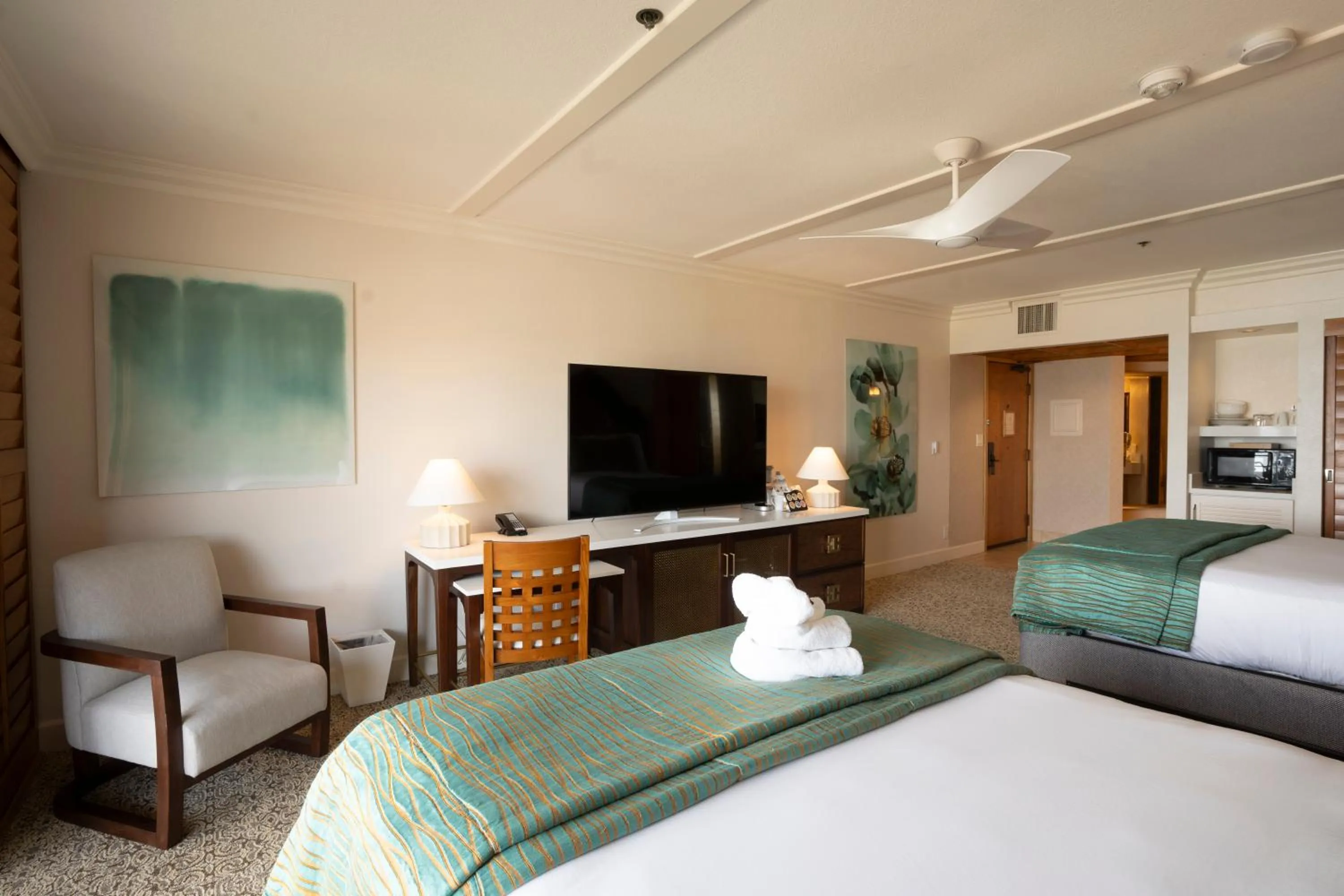 Bed in Pacific Terrace Hotel